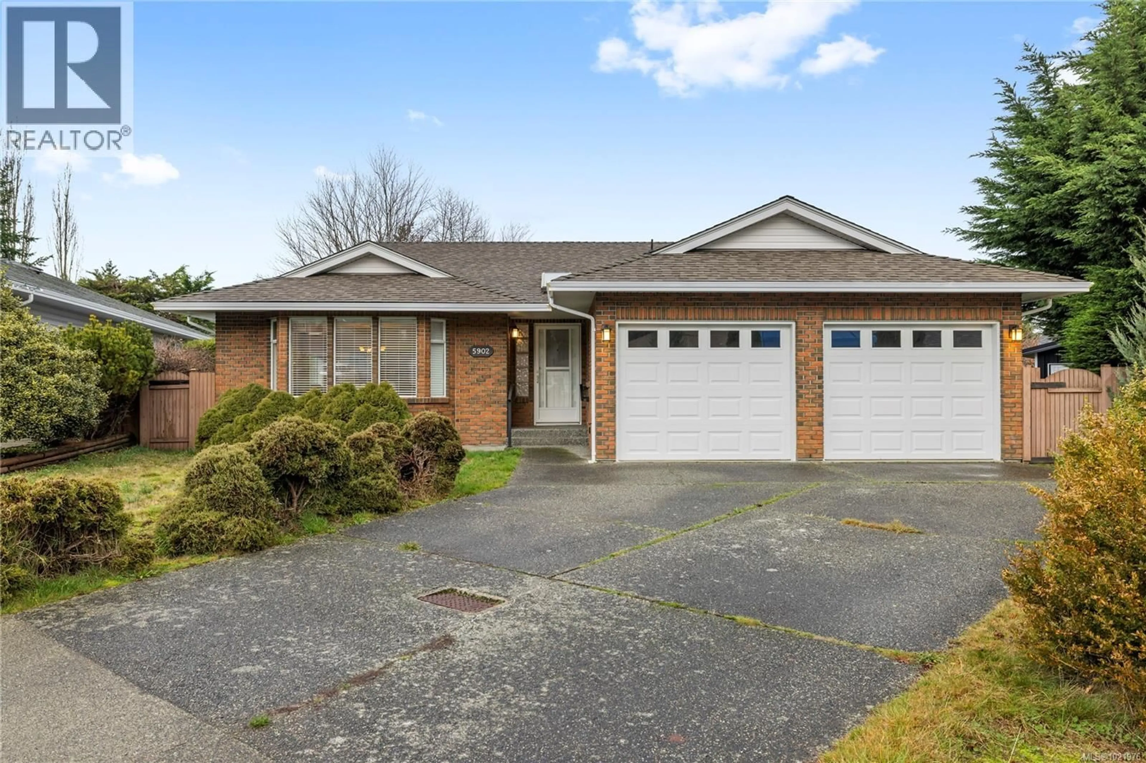 Home with brick exterior material, street for 5902 BEACON PLACE, Nanaimo British Columbia V9V1J6