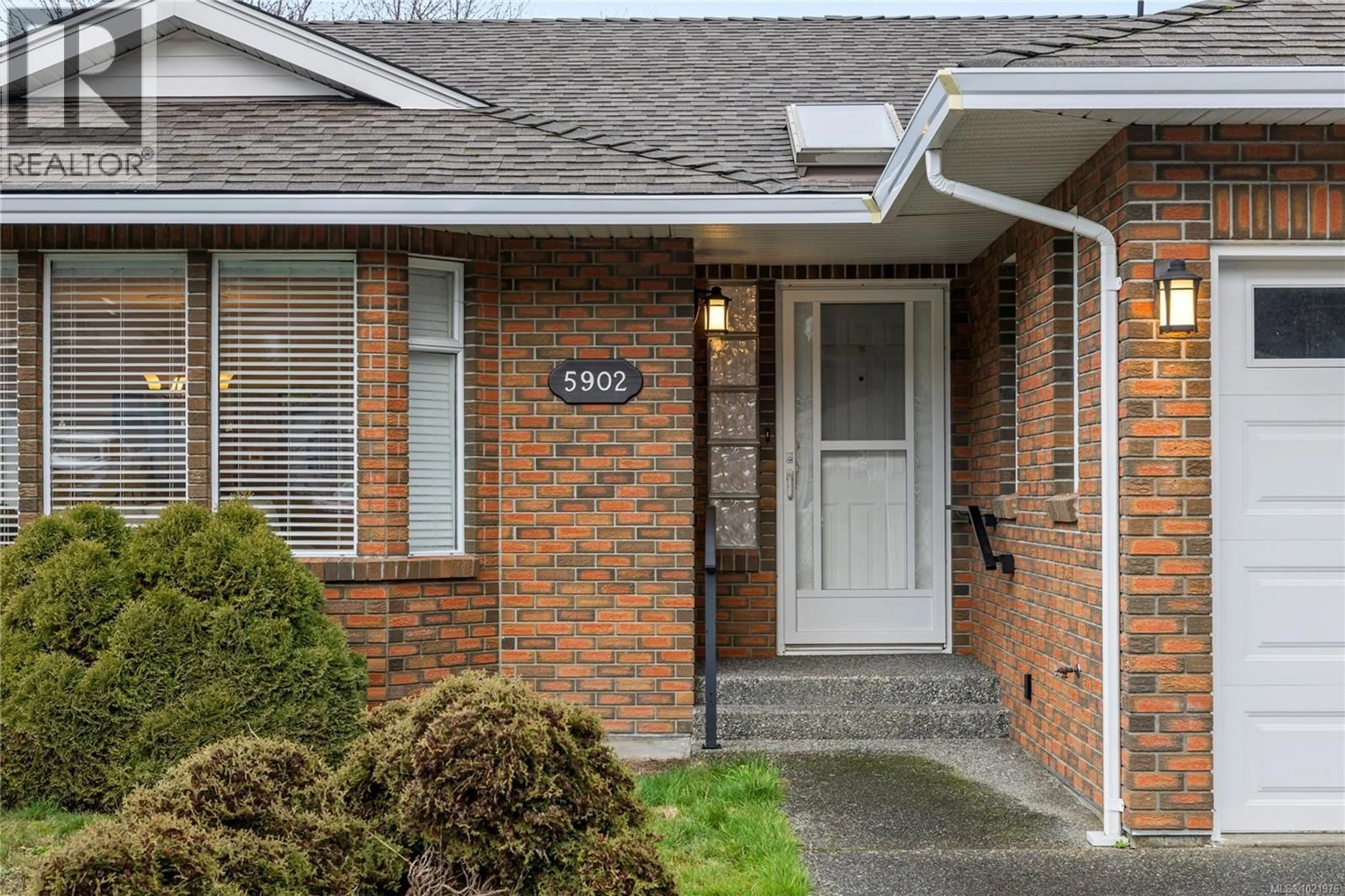 Home with brick exterior material, street for 5902 BEACON PLACE, Nanaimo British Columbia V9V1J6