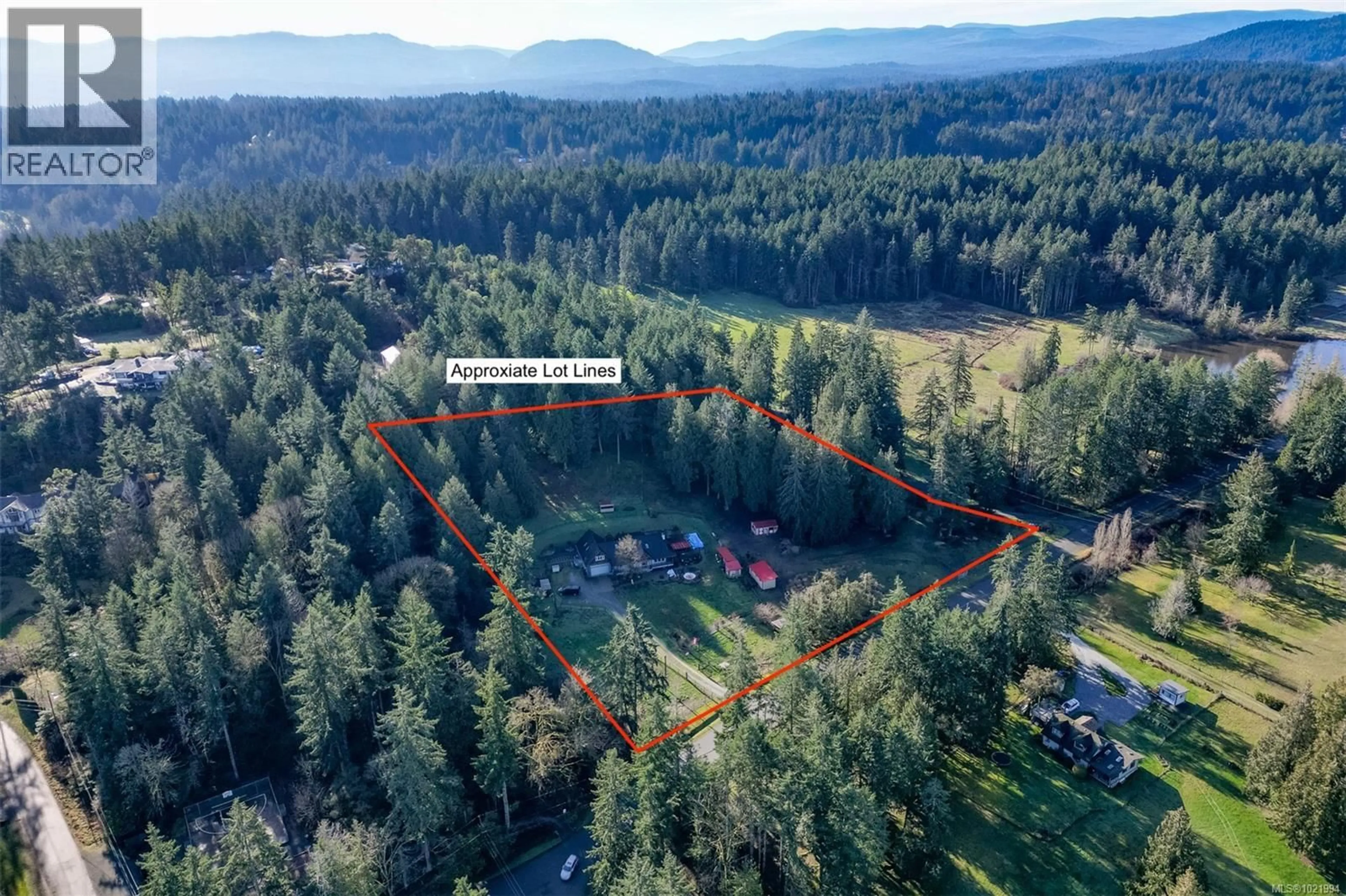 A pic from outside/outdoor area/front of a property/back of a property/a pic from drone, forest/trees view for 846 AROS ROAD, Cobble Hill British Columbia V0R1L4