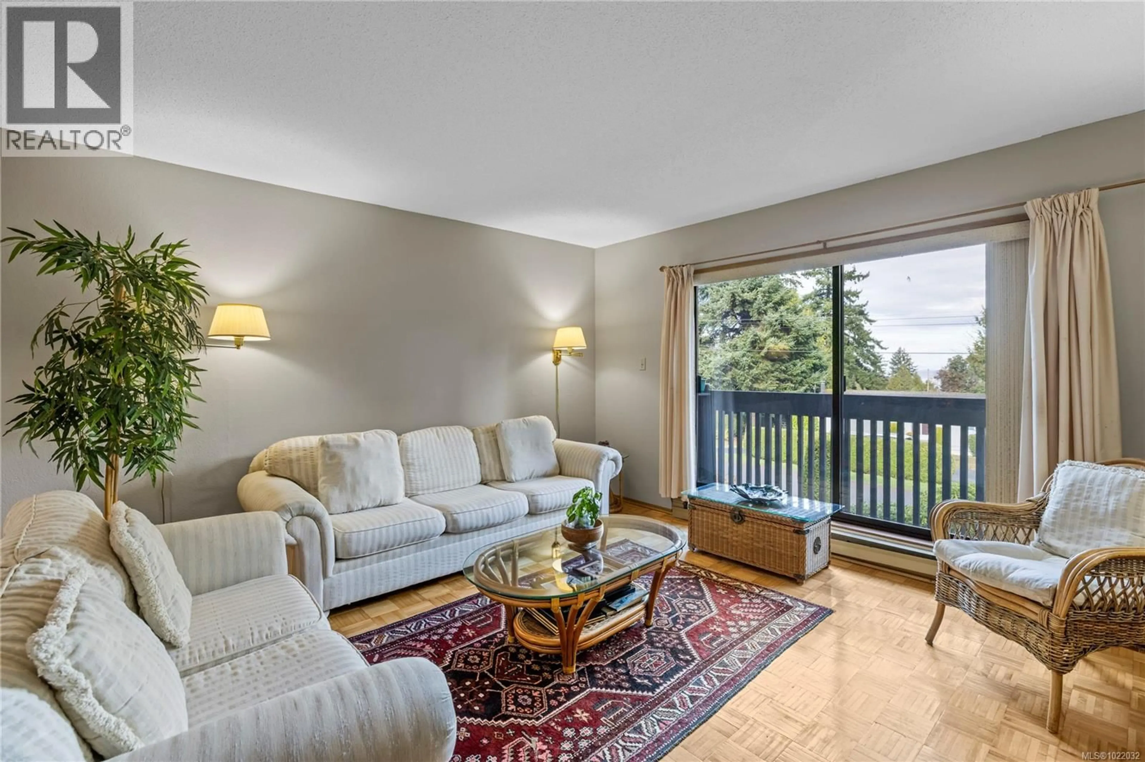 Living room with furniture, unknown for 202 - 130 SUNNINGDALE ROAD EAST, Qualicum Beach British Columbia V9K1P6