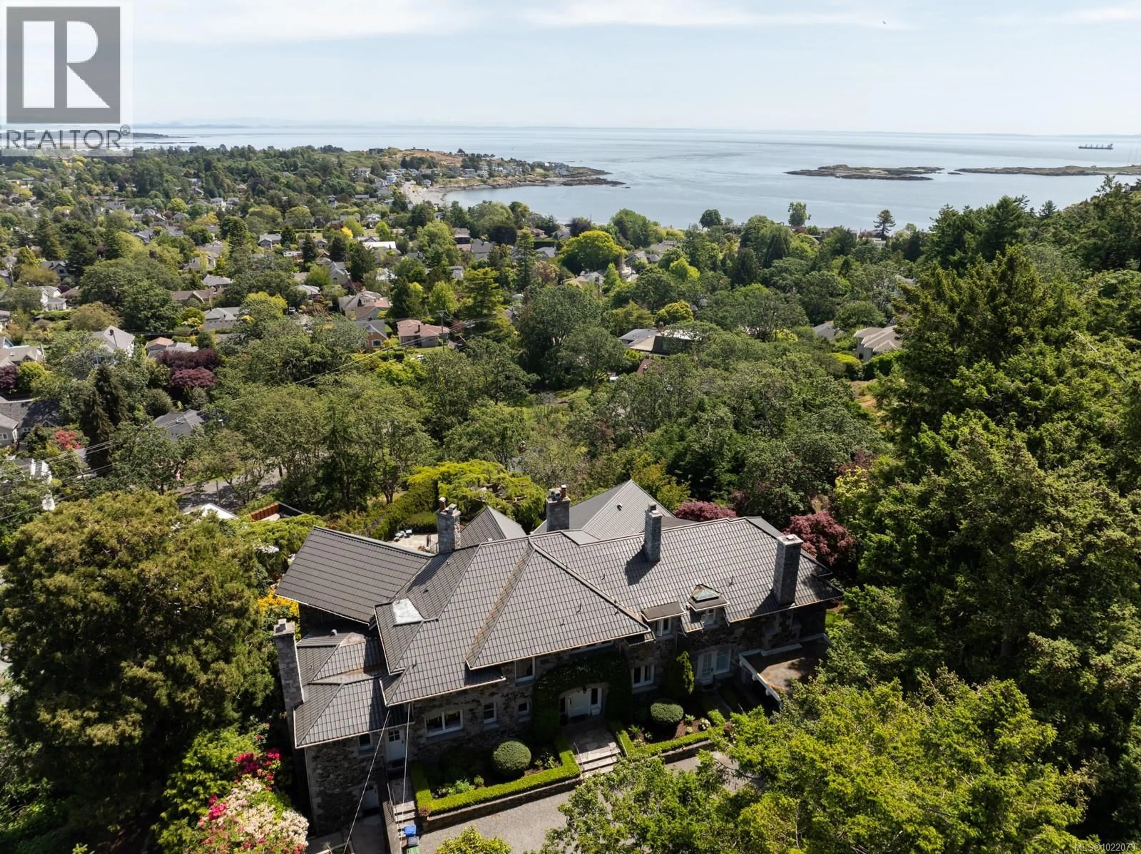 A pic from outside/outdoor area/front of a property/back of a property/a pic from drone, water/lake/river/ocean view for 305 DENISON ROAD, Oak Bay British Columbia V8S4K2