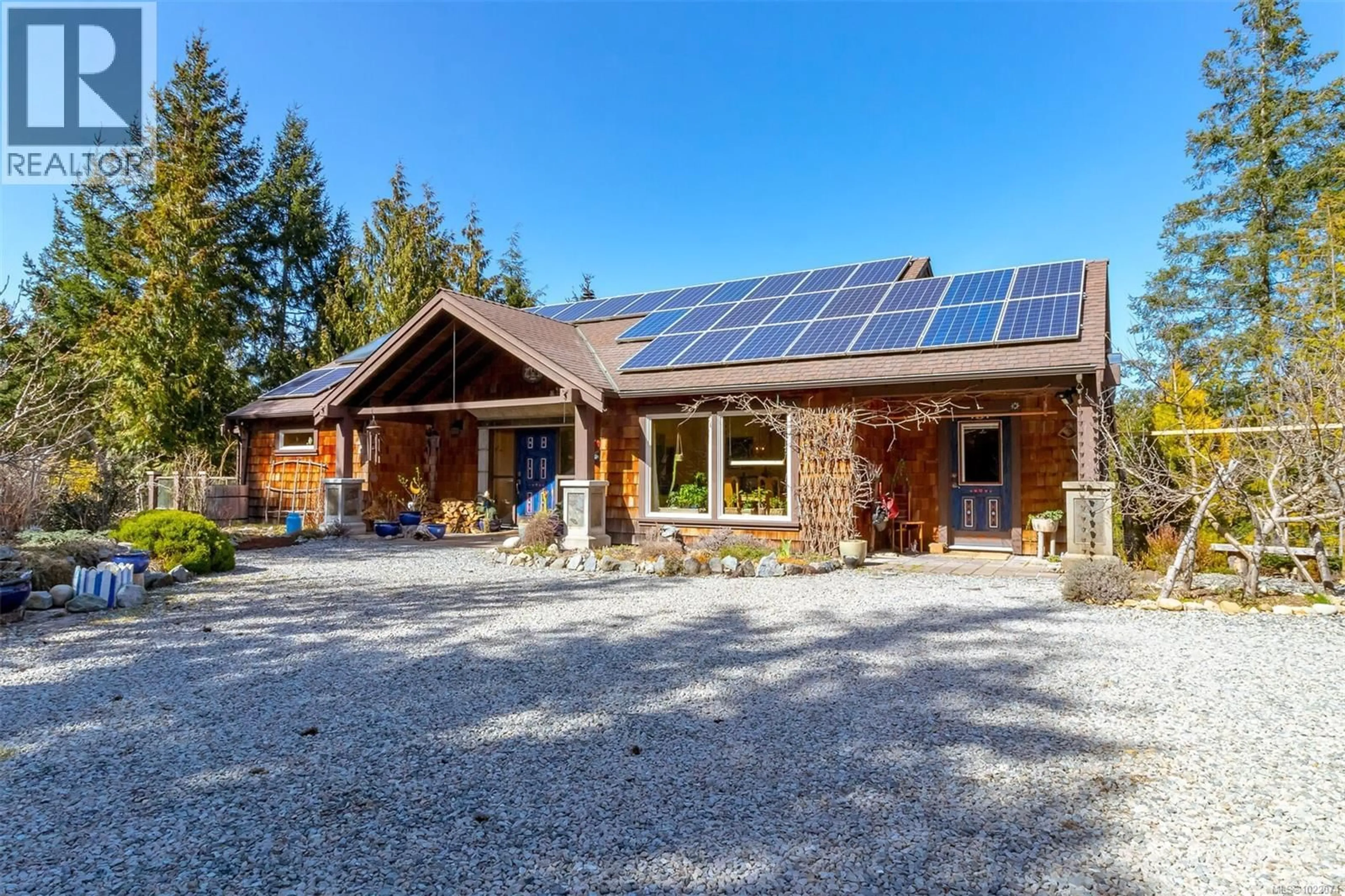 A pic from outside/outdoor area/front of a property/back of a property/a pic from drone, building for 1860 ASHLING ROAD, Qualicum Beach British Columbia V9K2V1