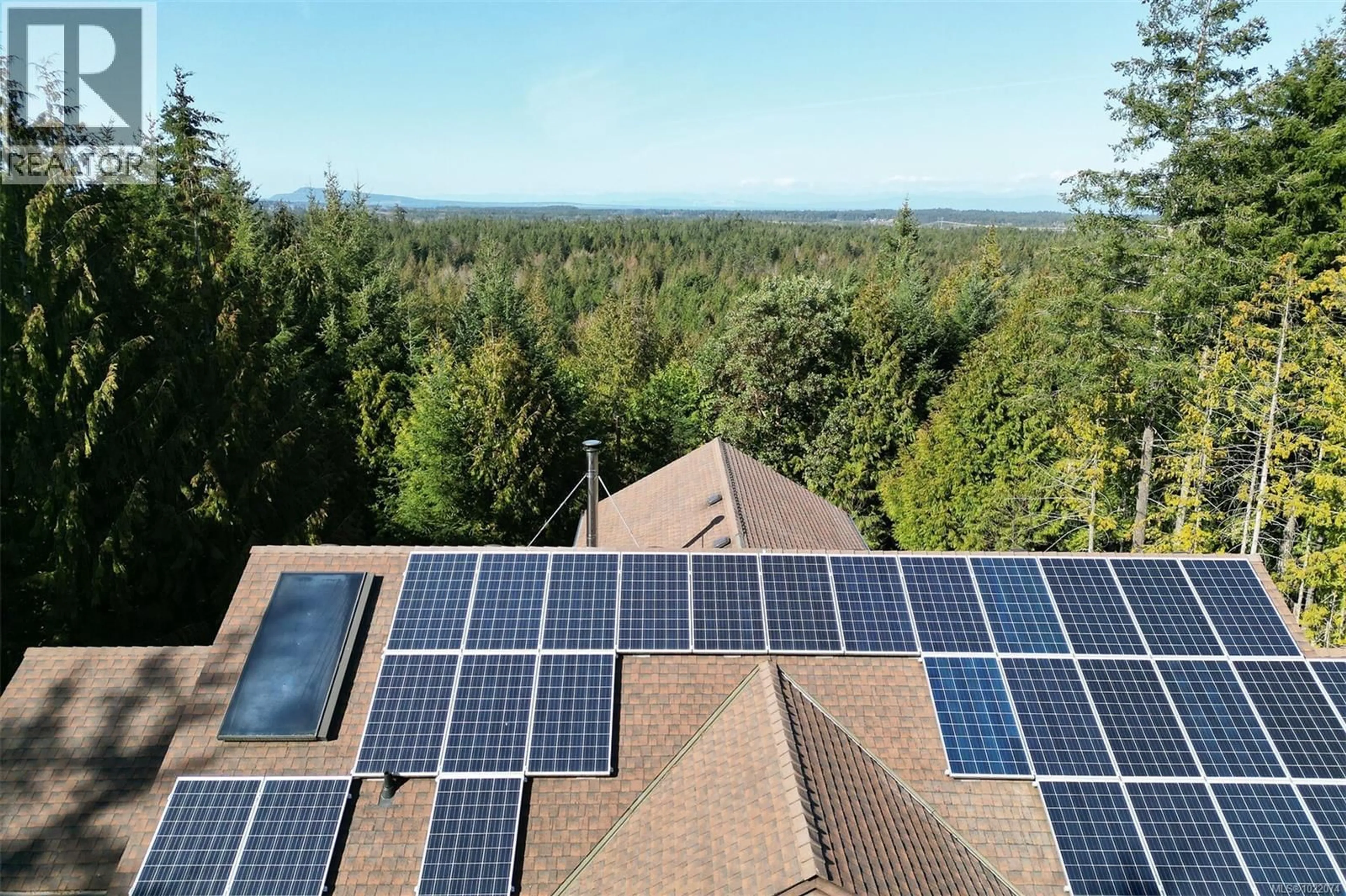 A pic from outside/outdoor area/front of a property/back of a property/a pic from drone, unknown for 1860 ASHLING ROAD, Qualicum Beach British Columbia V9K2V1