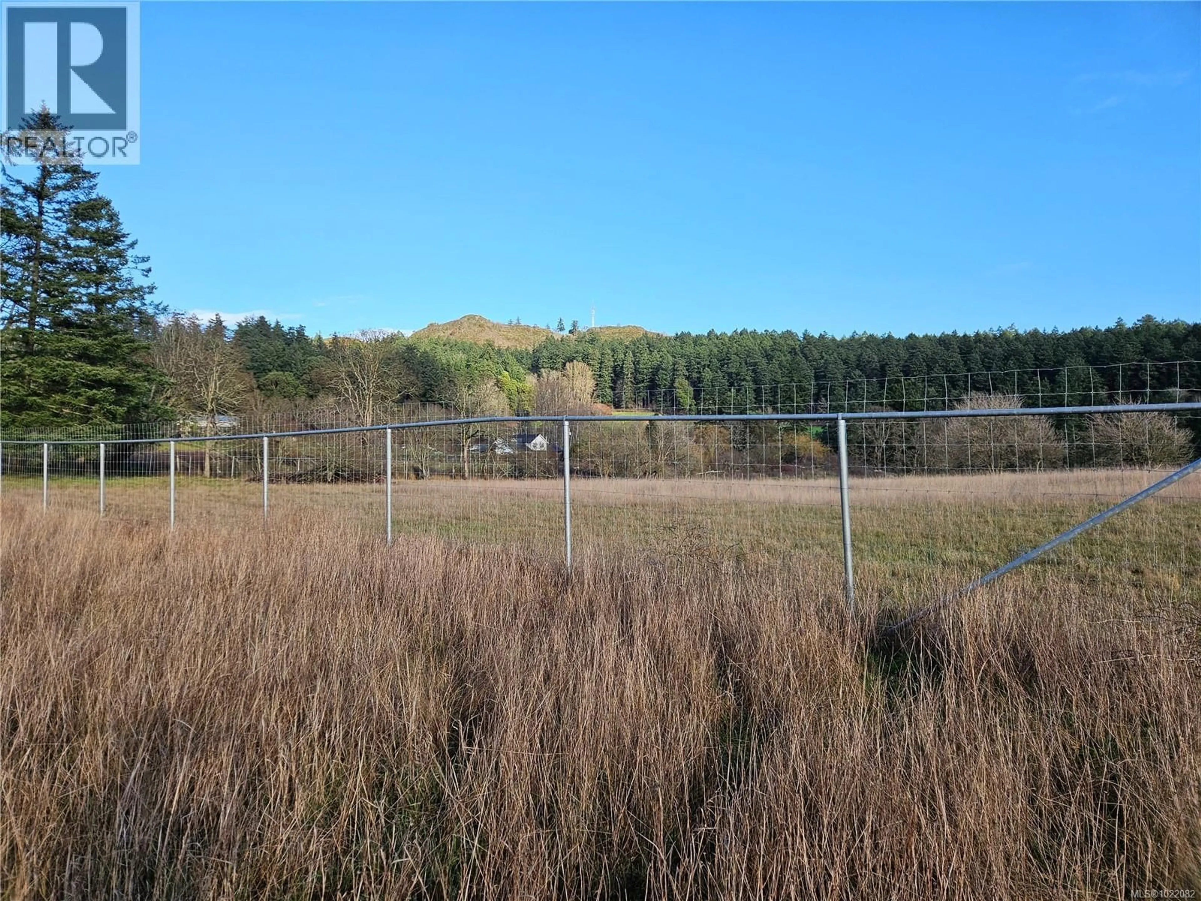 A pic from outside/outdoor area/front of a property/back of a property/a pic from drone, forest/trees view for 4299 BLENKINSOP ROAD, Saanich British Columbia V8X2C3