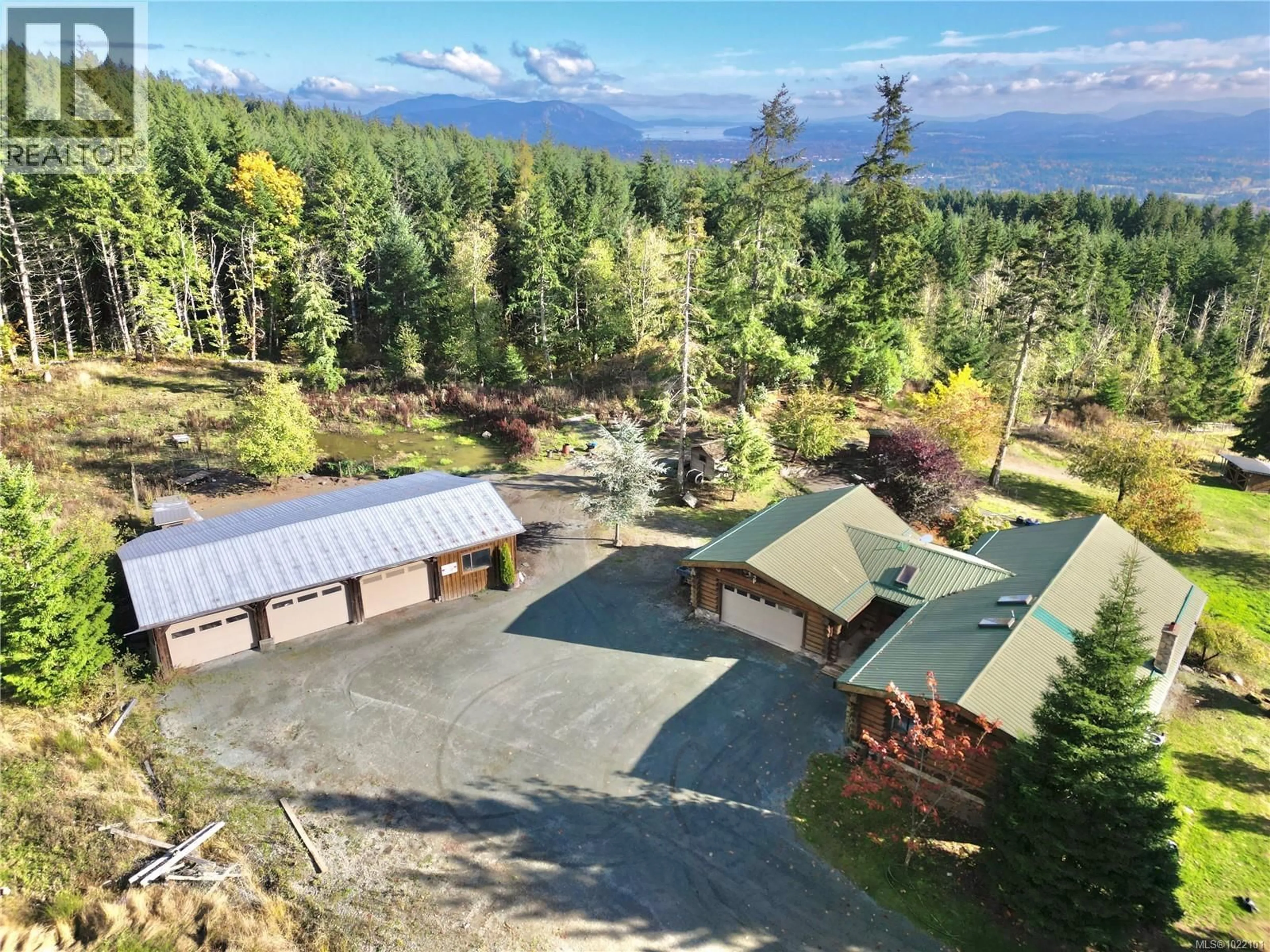 A pic from outside/outdoor area/front of a property/back of a property/a pic from drone, unknown for 6645 HILLCREST ROAD, Duncan British Columbia V9L6K4