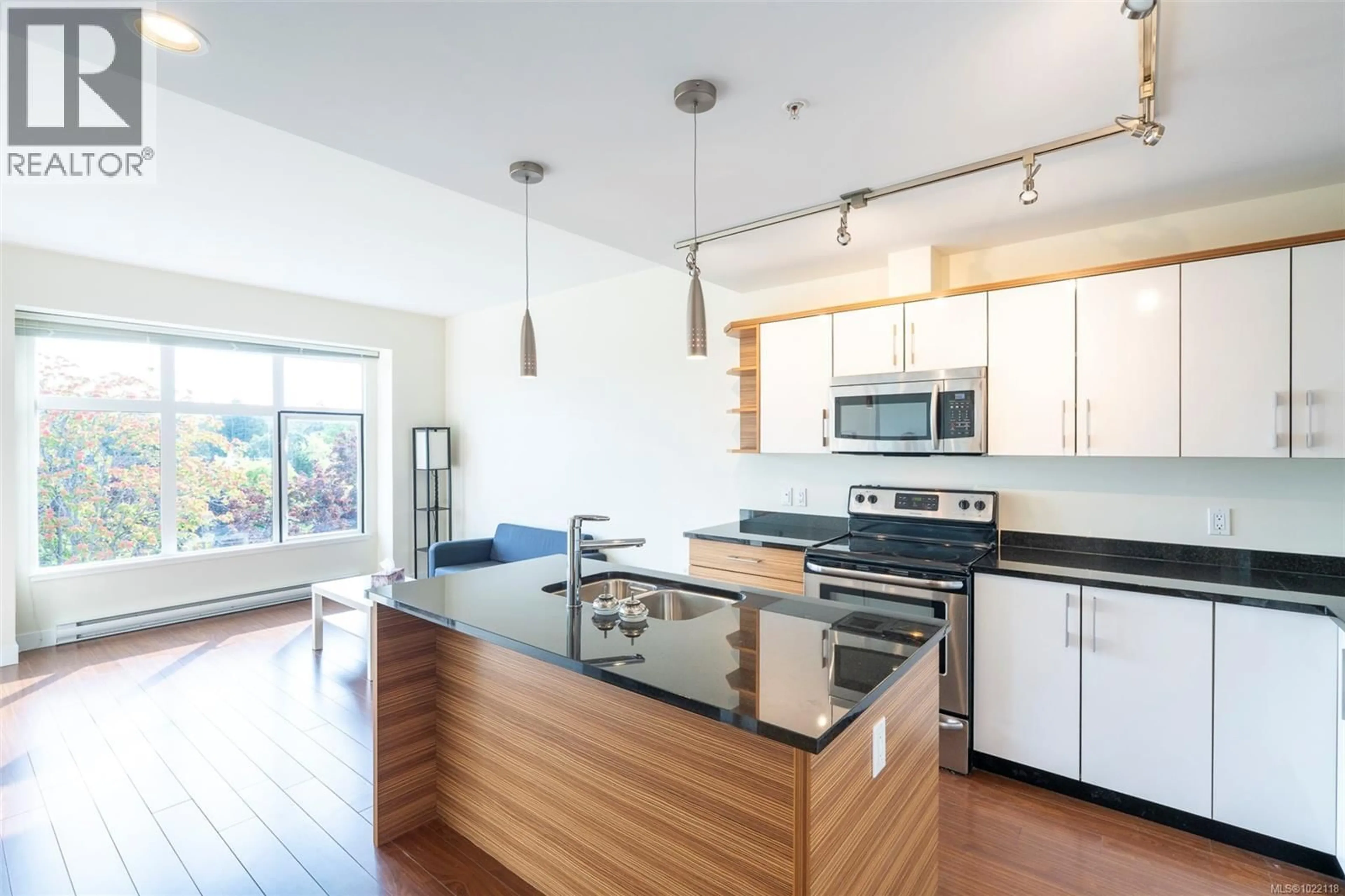 Open concept kitchen, unknown for 402 - 4030 BORDEN STREET, Saanich British Columbia V8X2E9