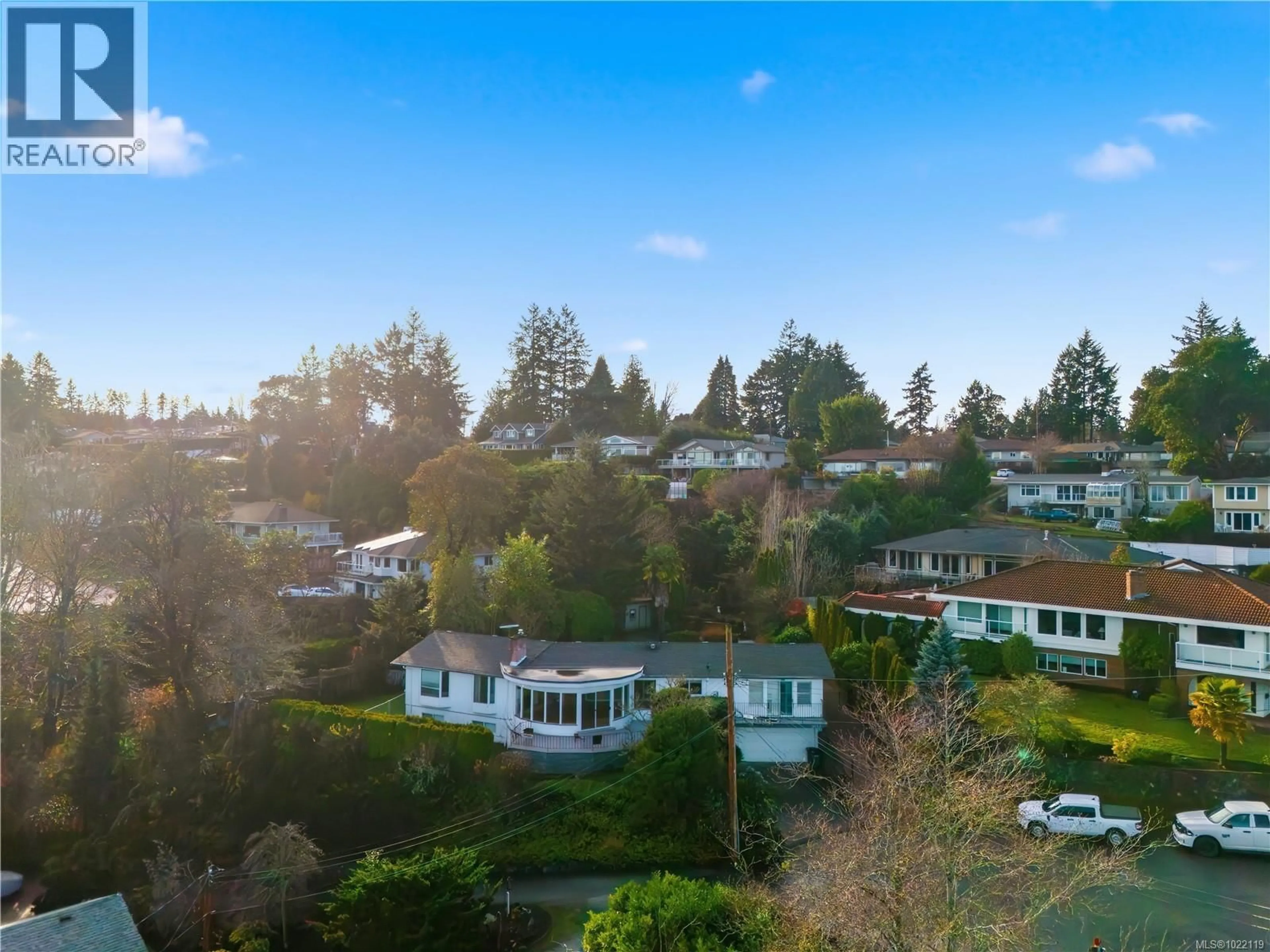 A pic from outside/outdoor area/front of a property/back of a property/a pic from drone, mountain view for 5054 CATALINA TERRACE, Saanich British Columbia V8Y2A5