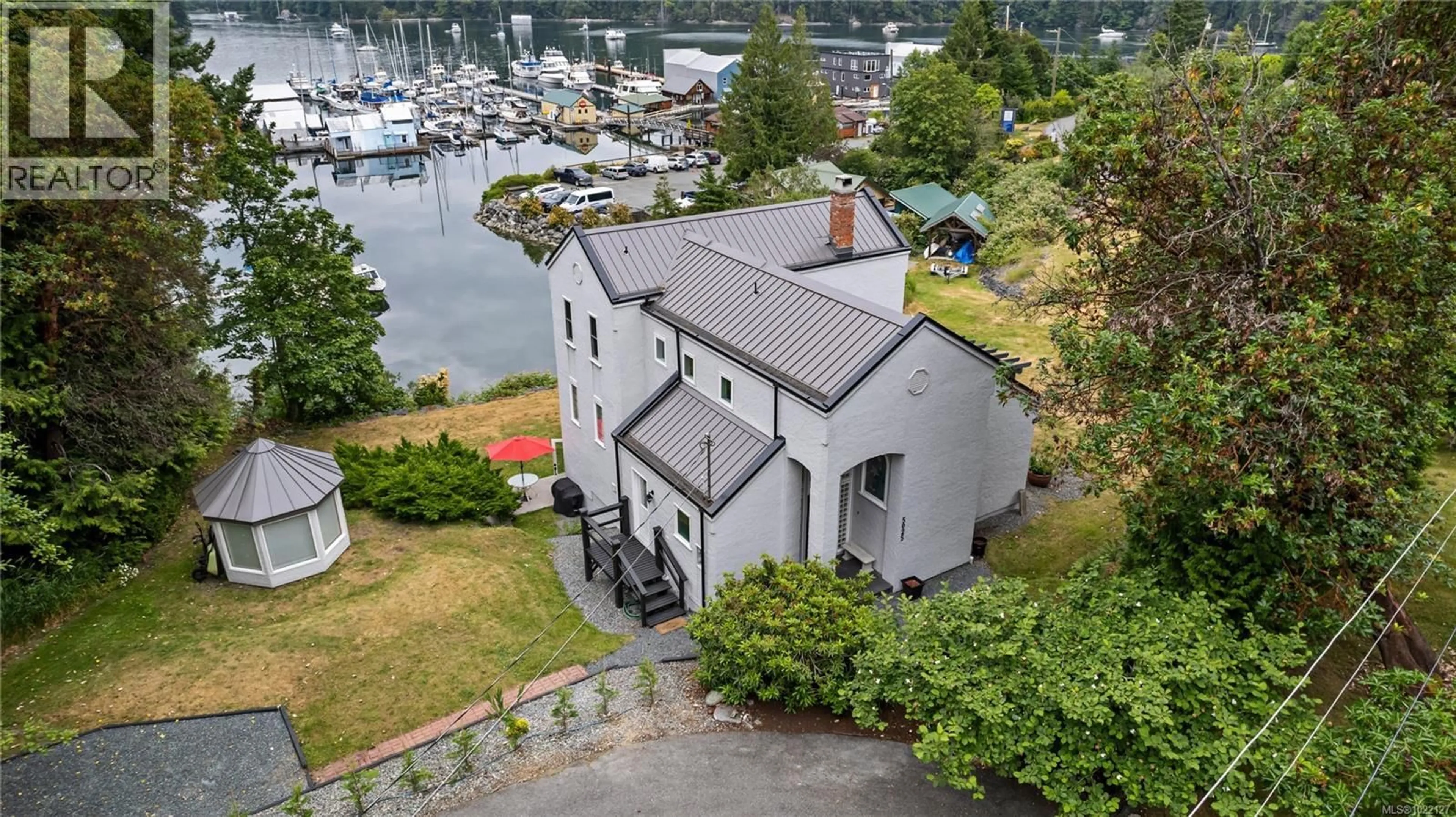 A pic from outside/outdoor area/front of a property/back of a property/a pic from drone, water/lake/river/ocean view for 5025 GENOA BAY ROAD, Duncan British Columbia V9L5Y6