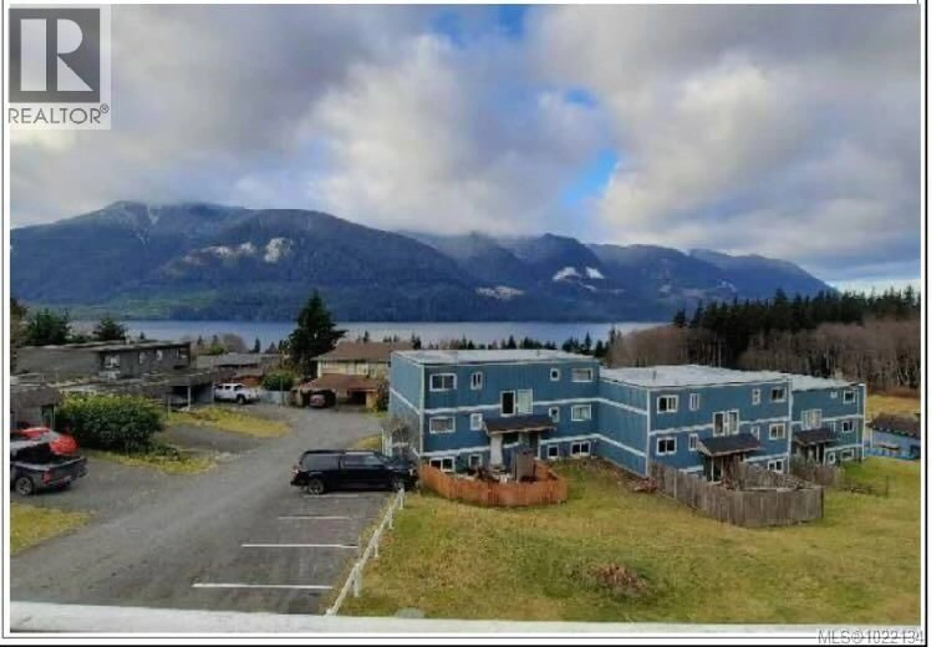 A pic from outside/outdoor area/front of a property/back of a property/a pic from drone, mountain view for 101 MCKAY CRESCENT, Port Alice British Columbia V0N2R0