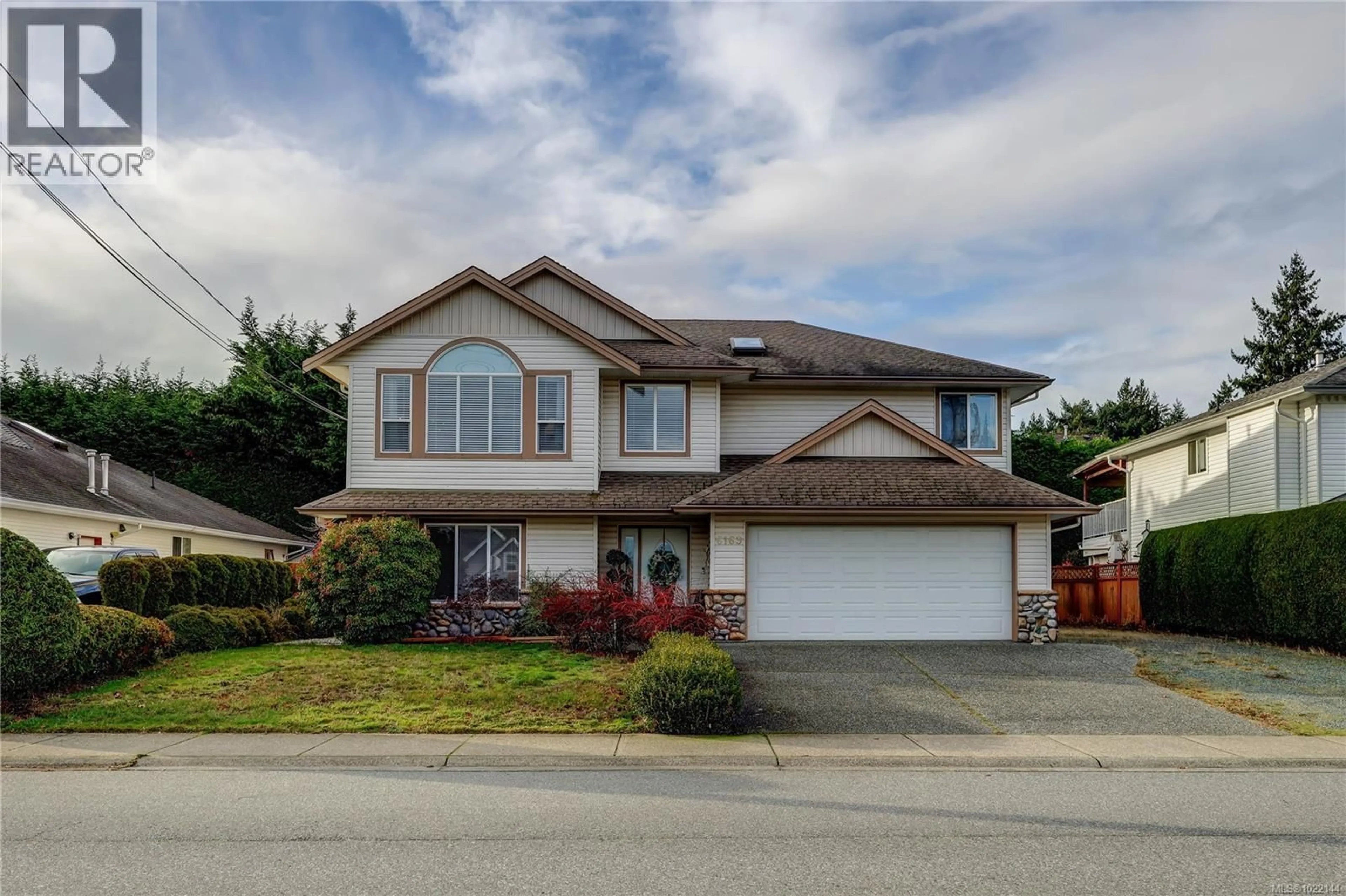 Home with vinyl exterior material, street for 6169 BRICKYARD ROAD, Nanaimo British Columbia V9V1K3