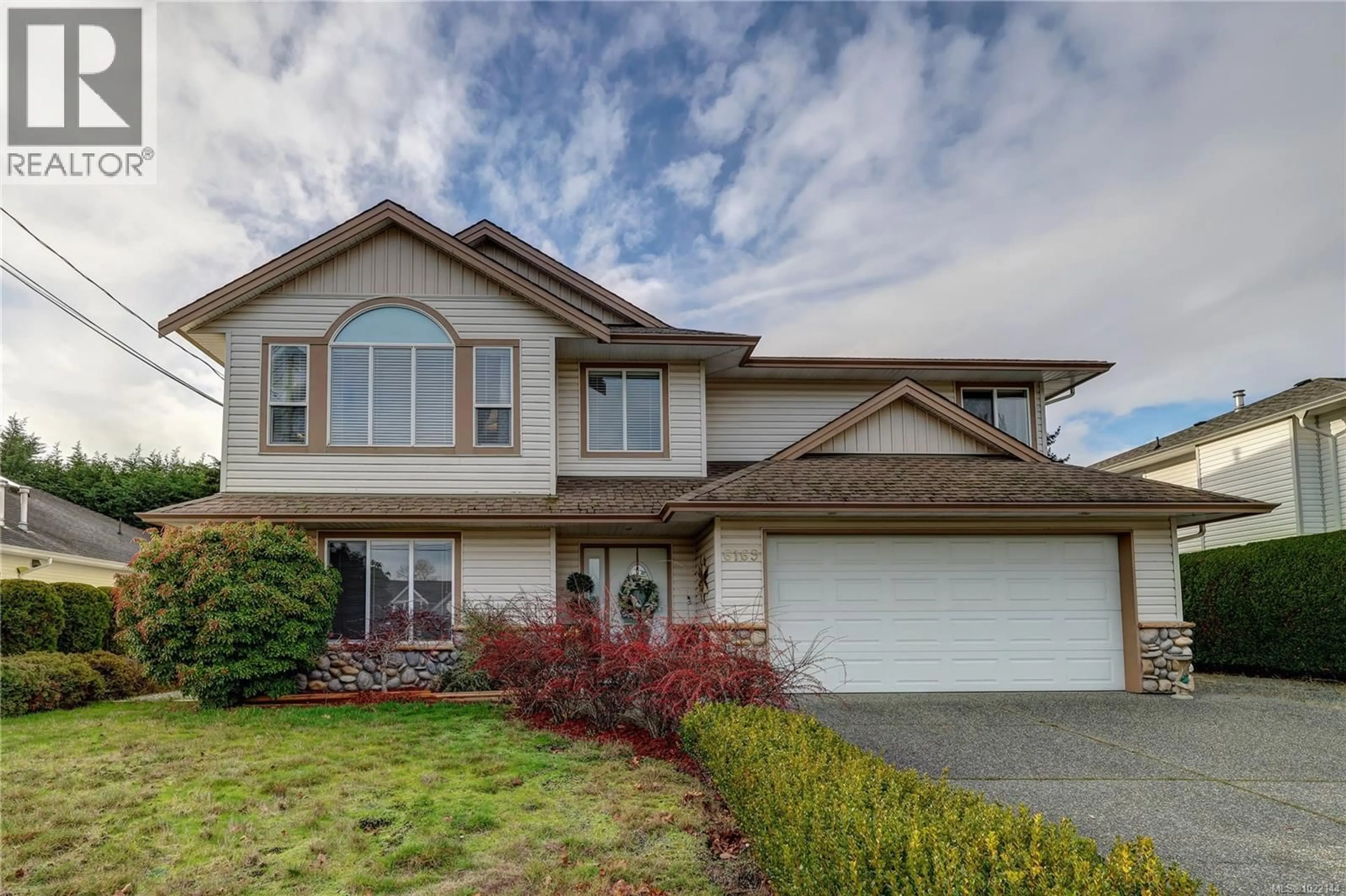 Home with vinyl exterior material, street for 6169 BRICKYARD ROAD, Nanaimo British Columbia V9V1K3