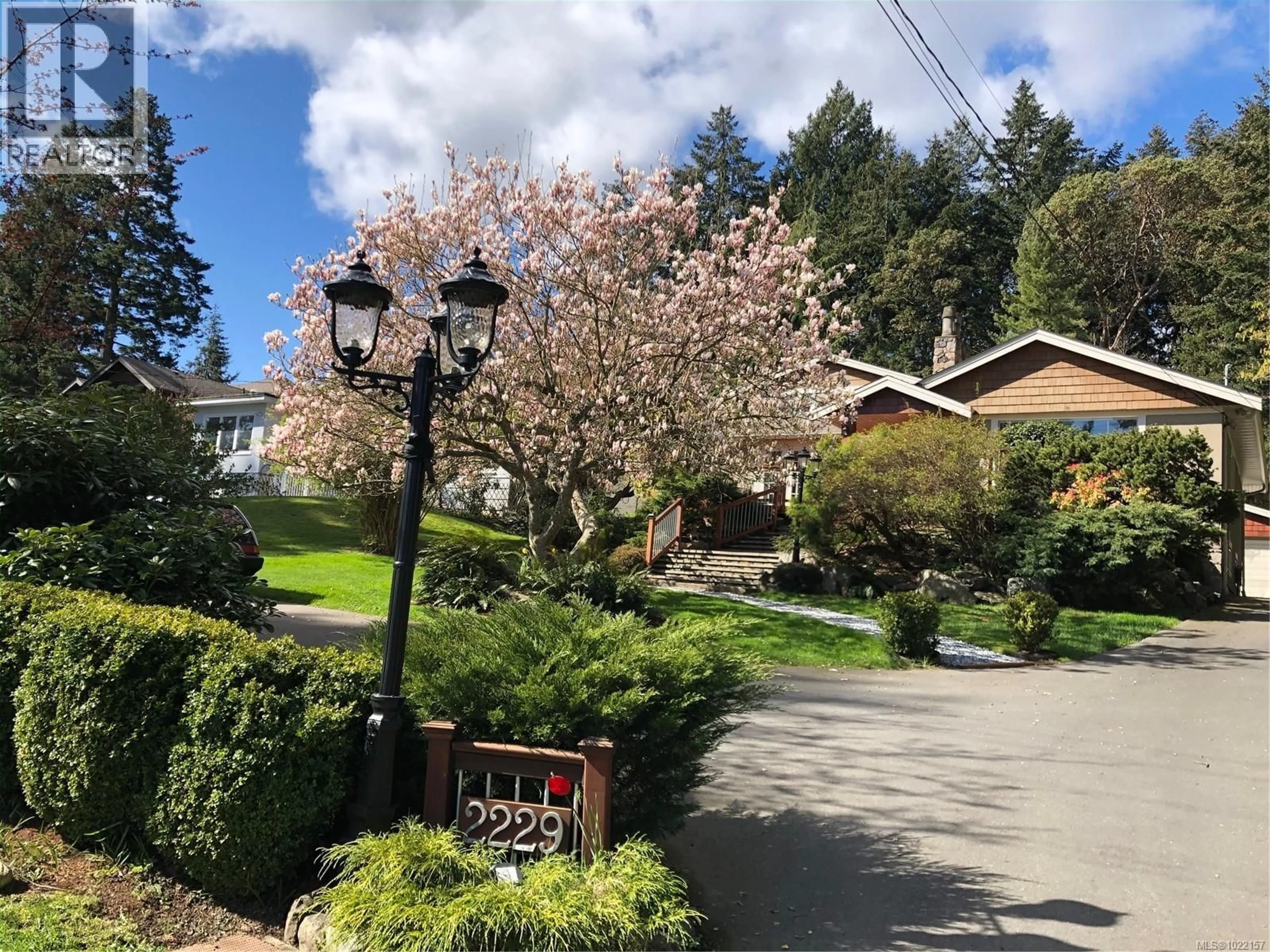 A pic from outside/outdoor area/front of a property/back of a property/a pic from drone, street for 2229 ARBUTUS ROAD, Saanich British Columbia V8N1V2