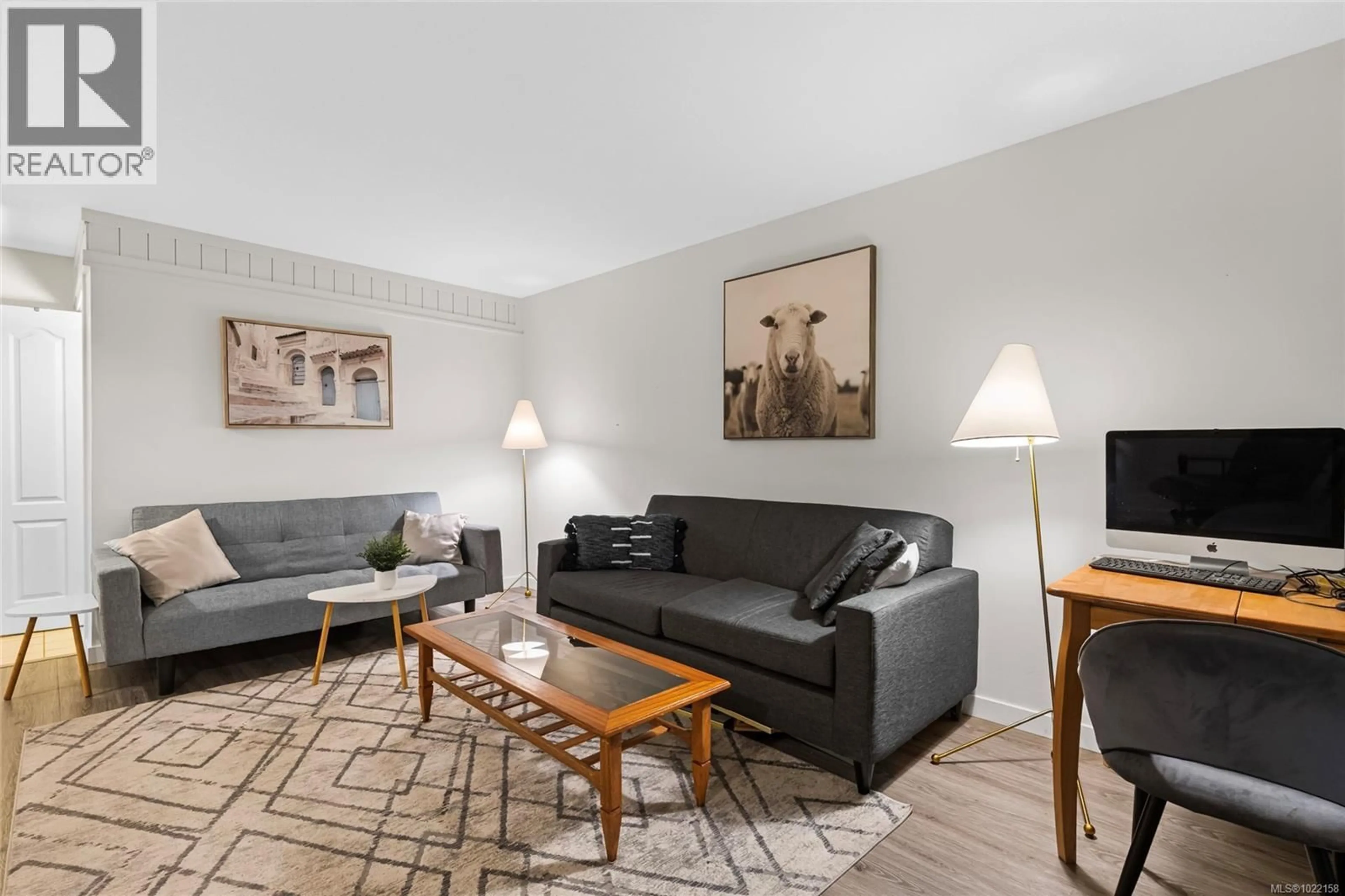 Living room with furniture, unknown for 103 - 1875 LANSDOWNE ROAD, Saanich British Columbia V8P1A9