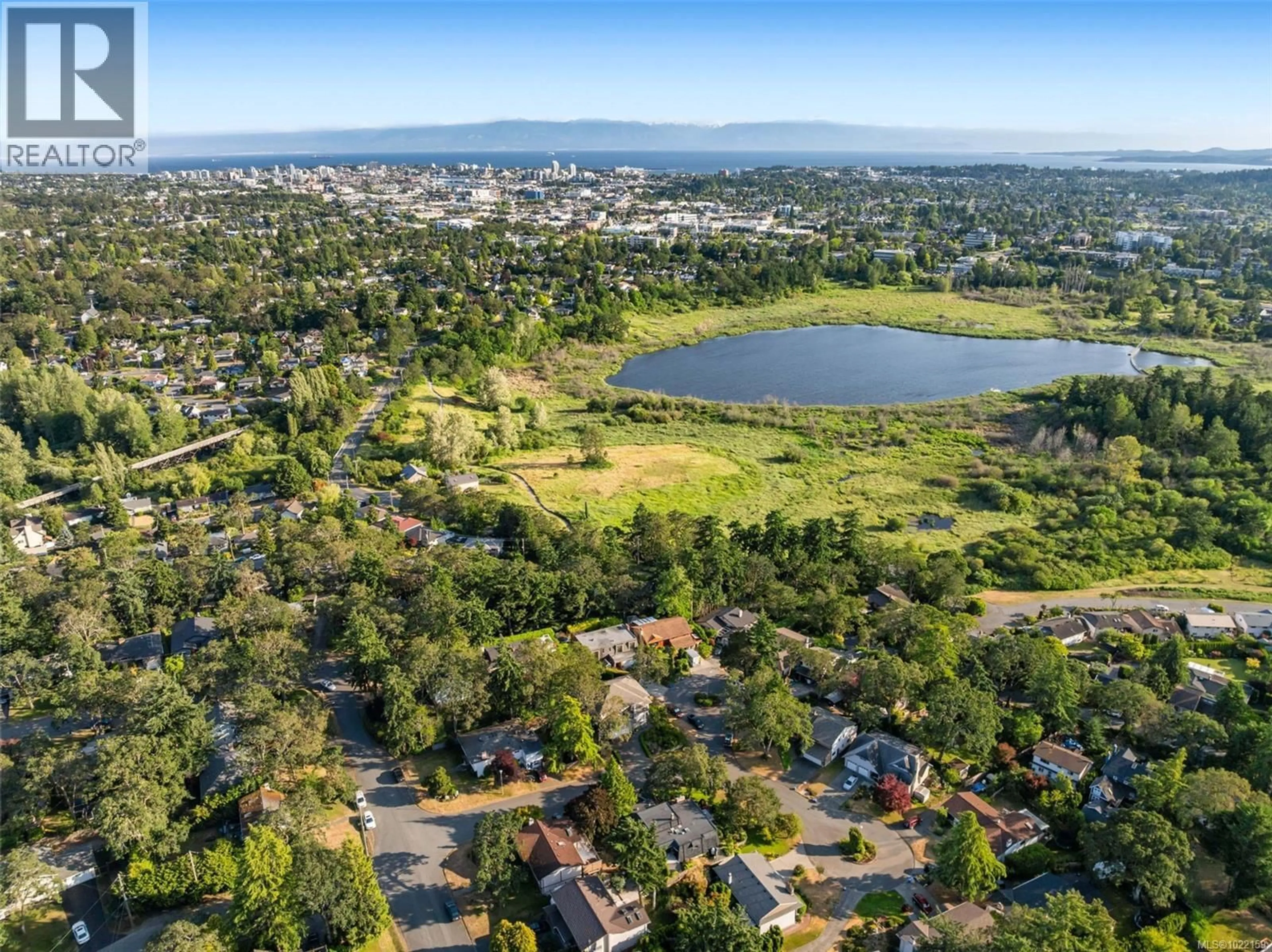 A pic from outside/outdoor area/front of a property/back of a property/a pic from drone, water/lake/river/ocean view for 994 LANDEEN PLACE, Saanich British Columbia V8X3Z3