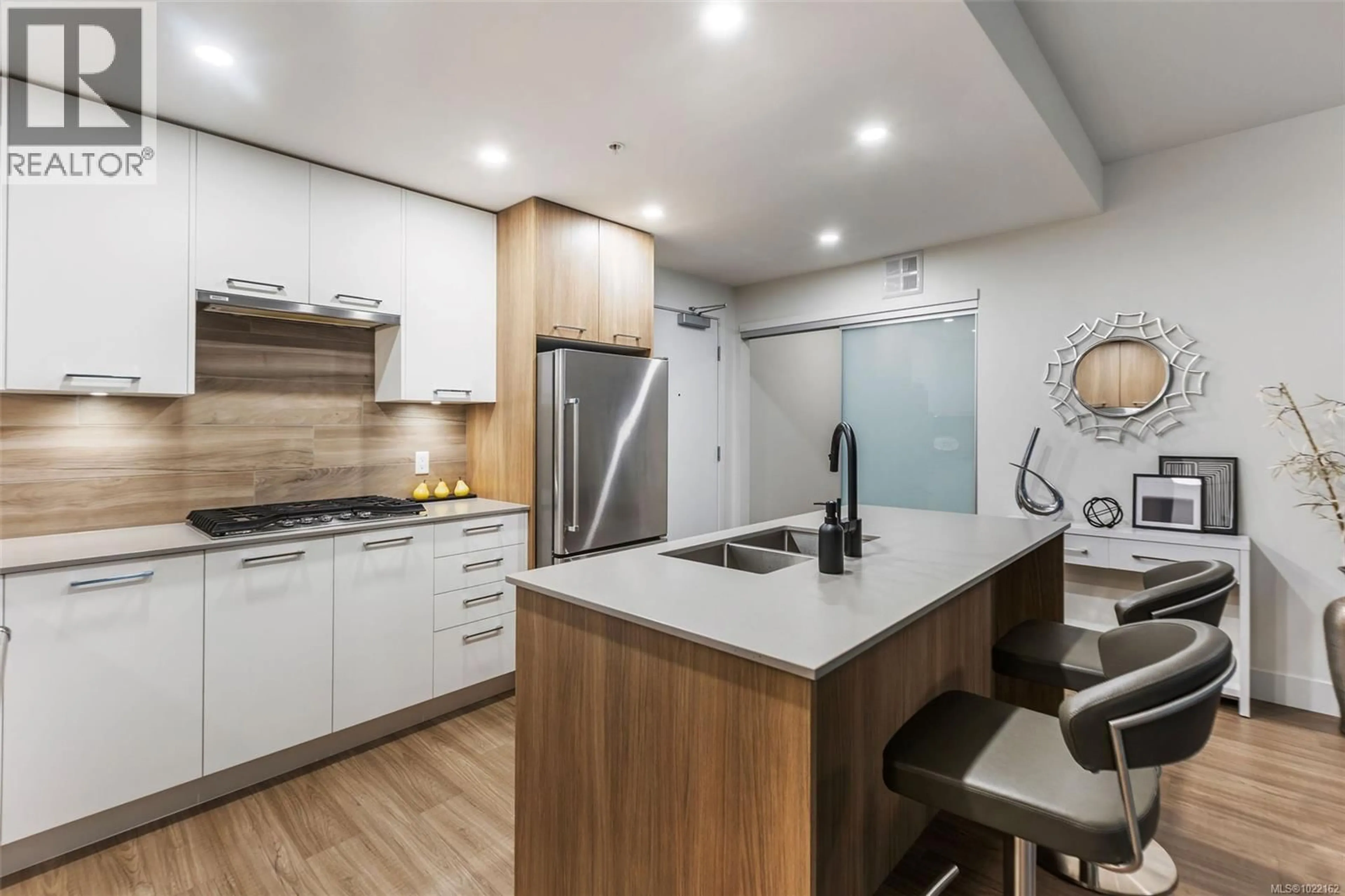 Open concept kitchen, unknown for 211 - 960 REUNION AVENUE, Langford British Columbia V9B0W5