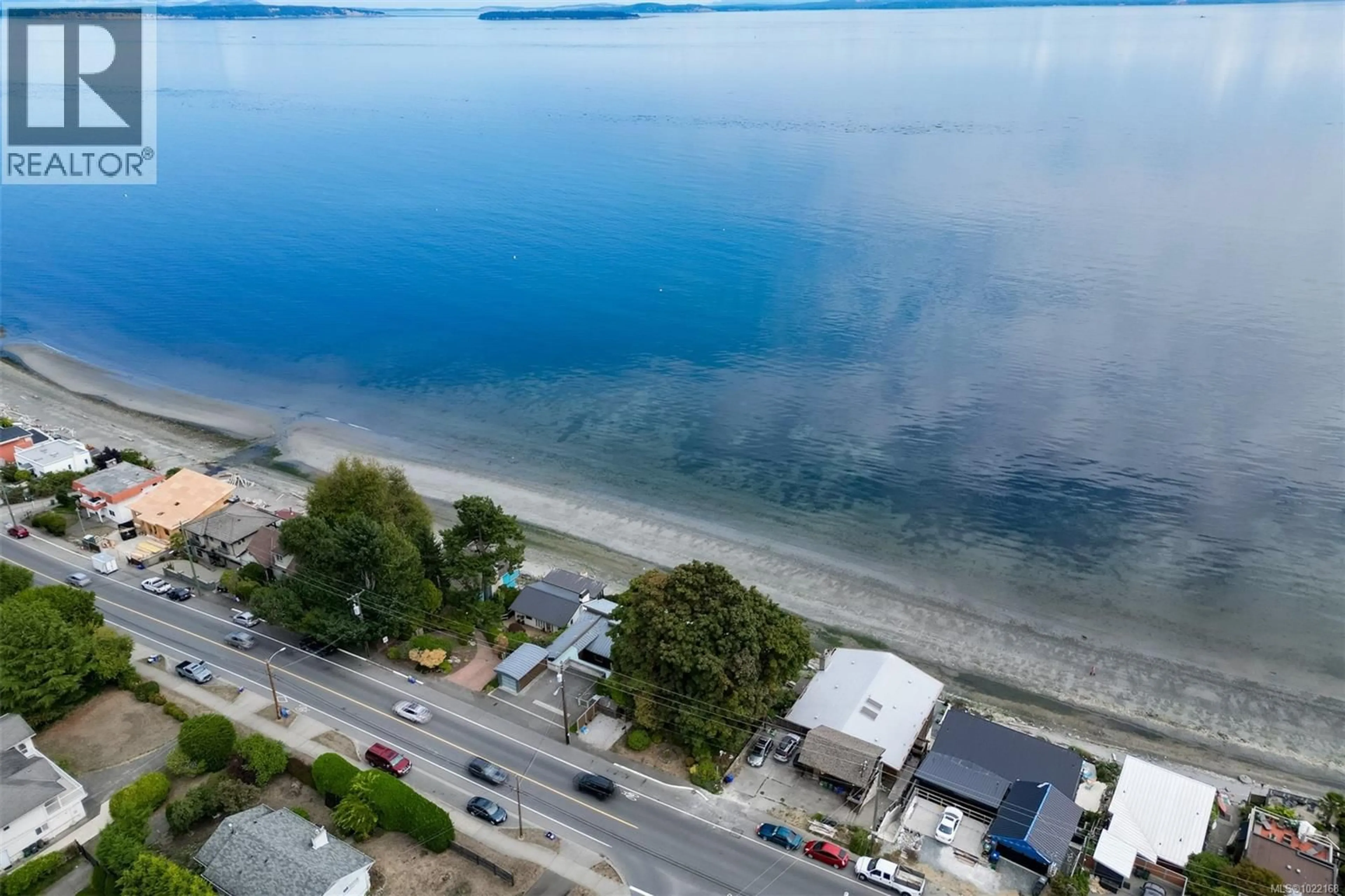 A pic from outside/outdoor area/front of a property/back of a property/a pic from drone, water/lake/river/ocean view for 5037 CORDOVA BAY ROAD, Saanich British Columbia V8Y2K1
