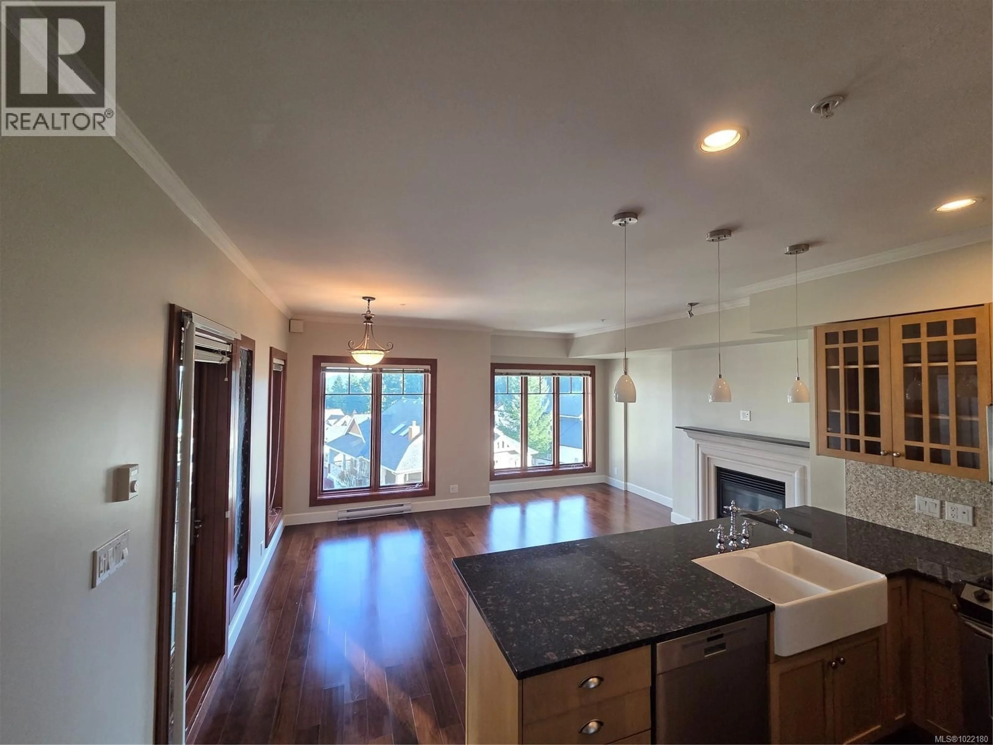 Open concept kitchen, wood/laminate floor for 305 - 2006 TROON COURT, Langford British Columbia V9B6T4