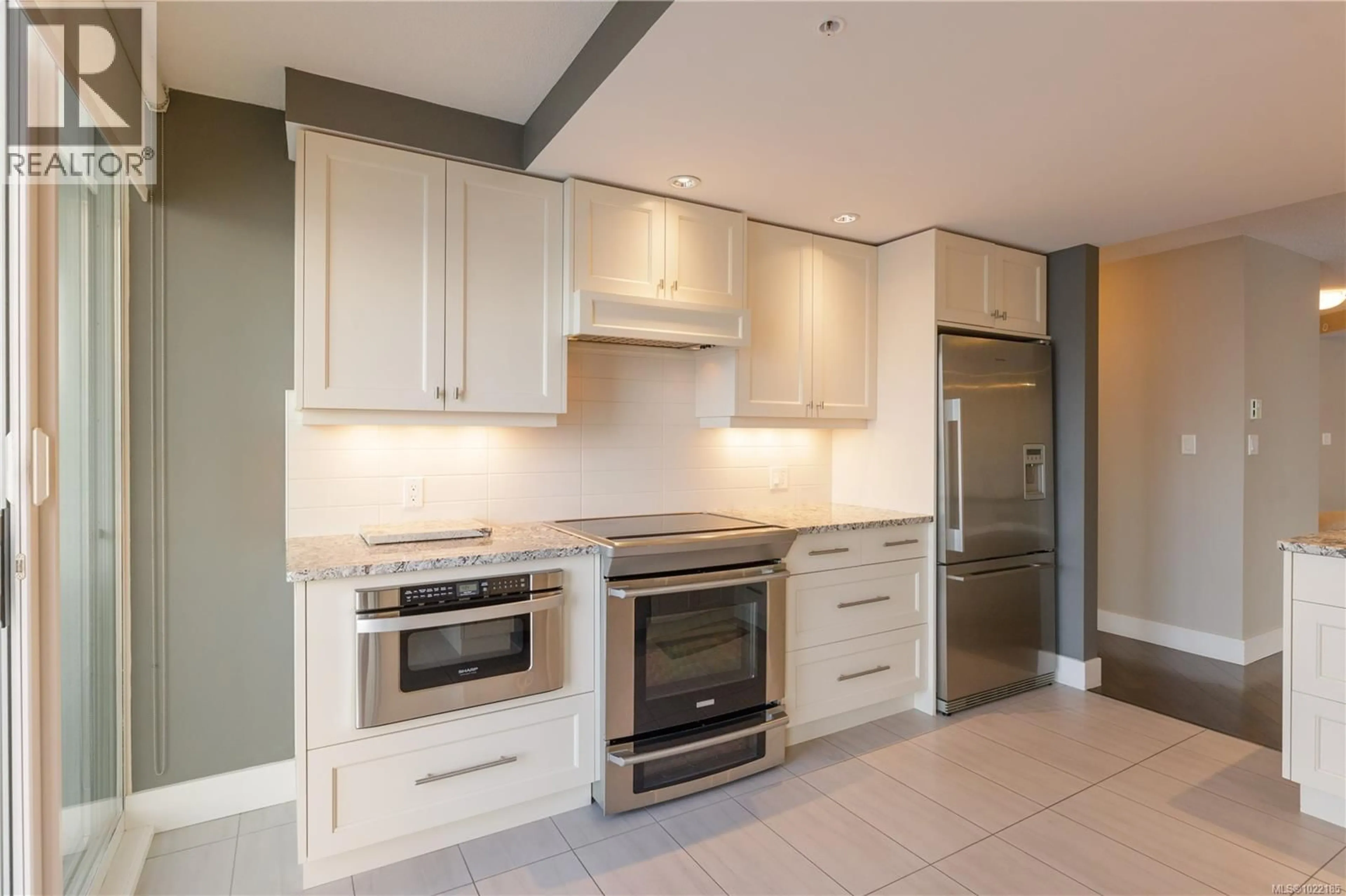 Open concept kitchen, ceramic/tile floor for 1501 - 154 PROMENADE DRIVE, Nanaimo British Columbia V9R6Y3