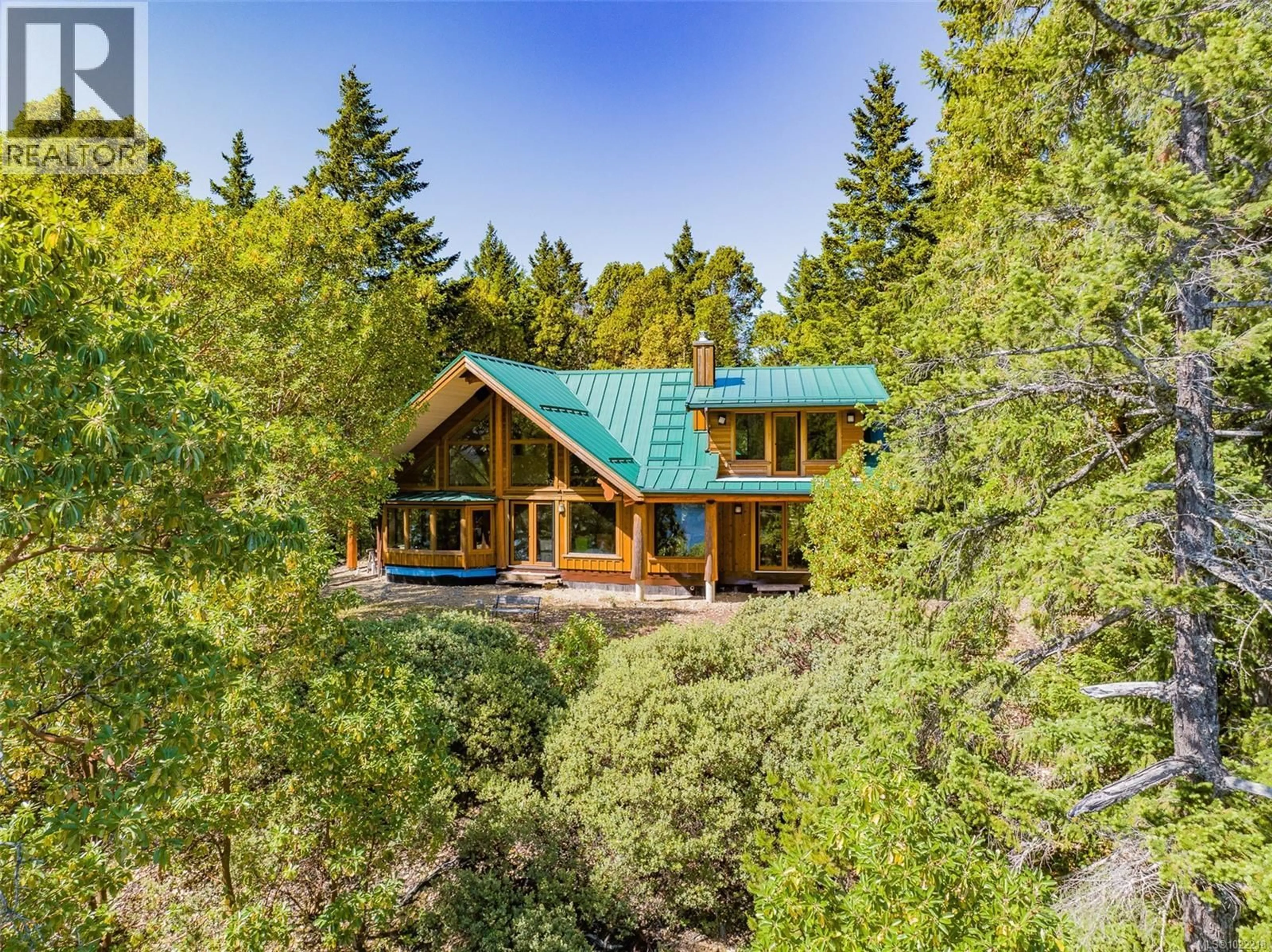 A pic from outside/outdoor area/front of a property/back of a property/a pic from drone, forest/trees view for 1100 KEITH ROAD, Qualicum Beach British Columbia V9K2L7