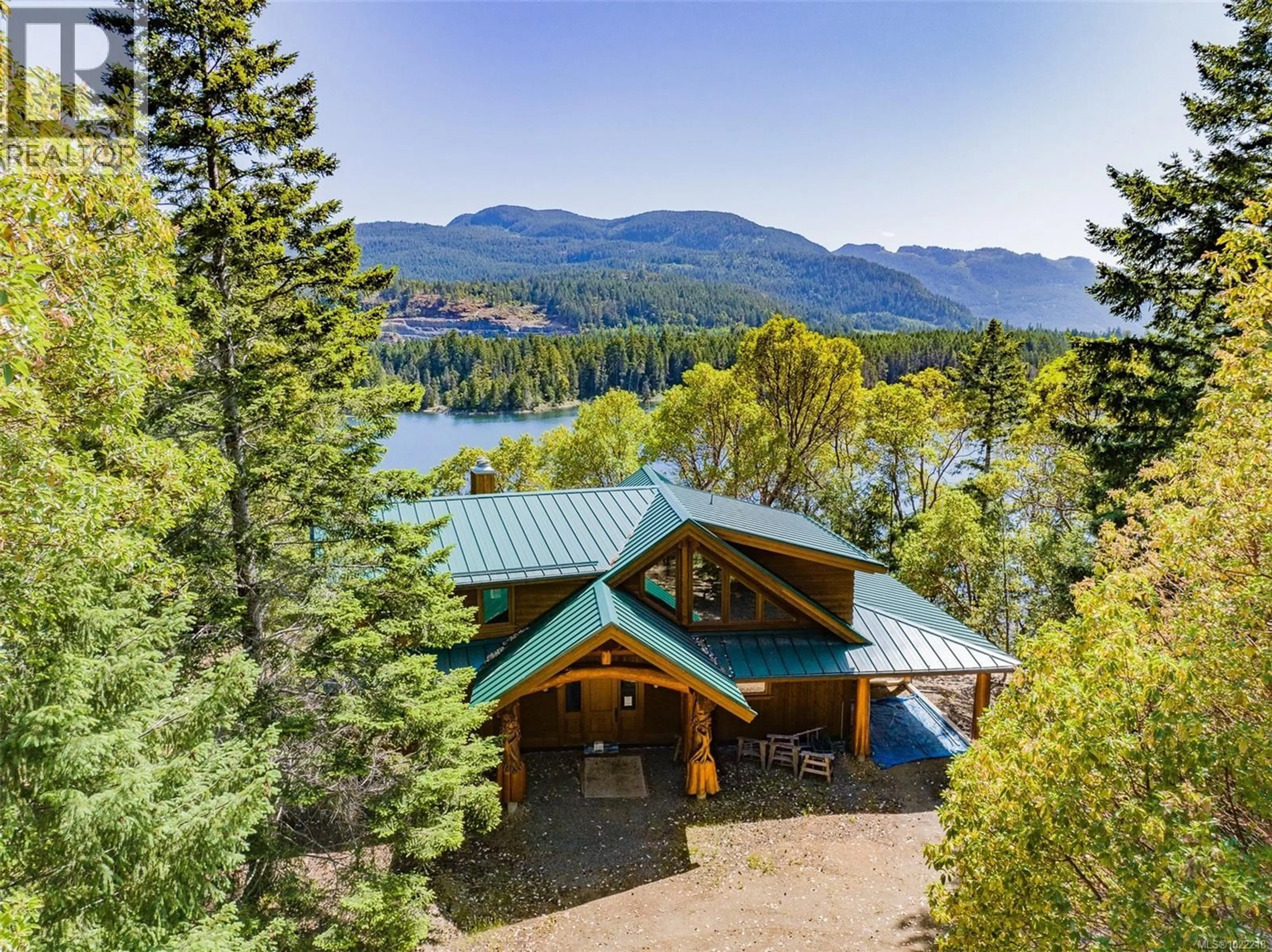 A pic from outside/outdoor area/front of a property/back of a property/a pic from drone, water/lake/river/ocean view for 1100 KEITH ROAD, Qualicum Beach British Columbia V9K2L7