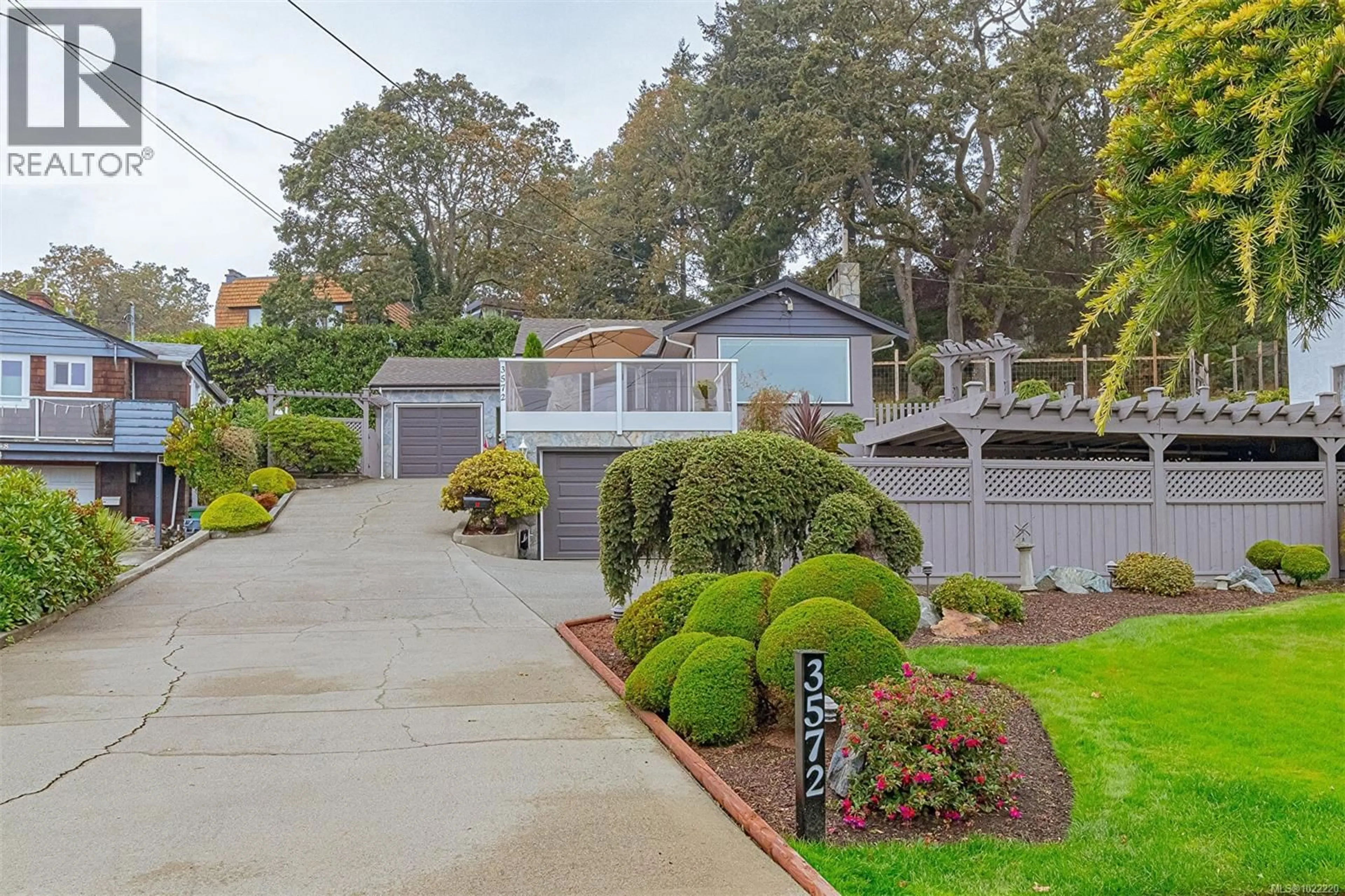 A pic from outside/outdoor area/front of a property/back of a property/a pic from drone, street for 3572 CEDAR HILL ROAD, Saanich British Columbia V8P3Z1