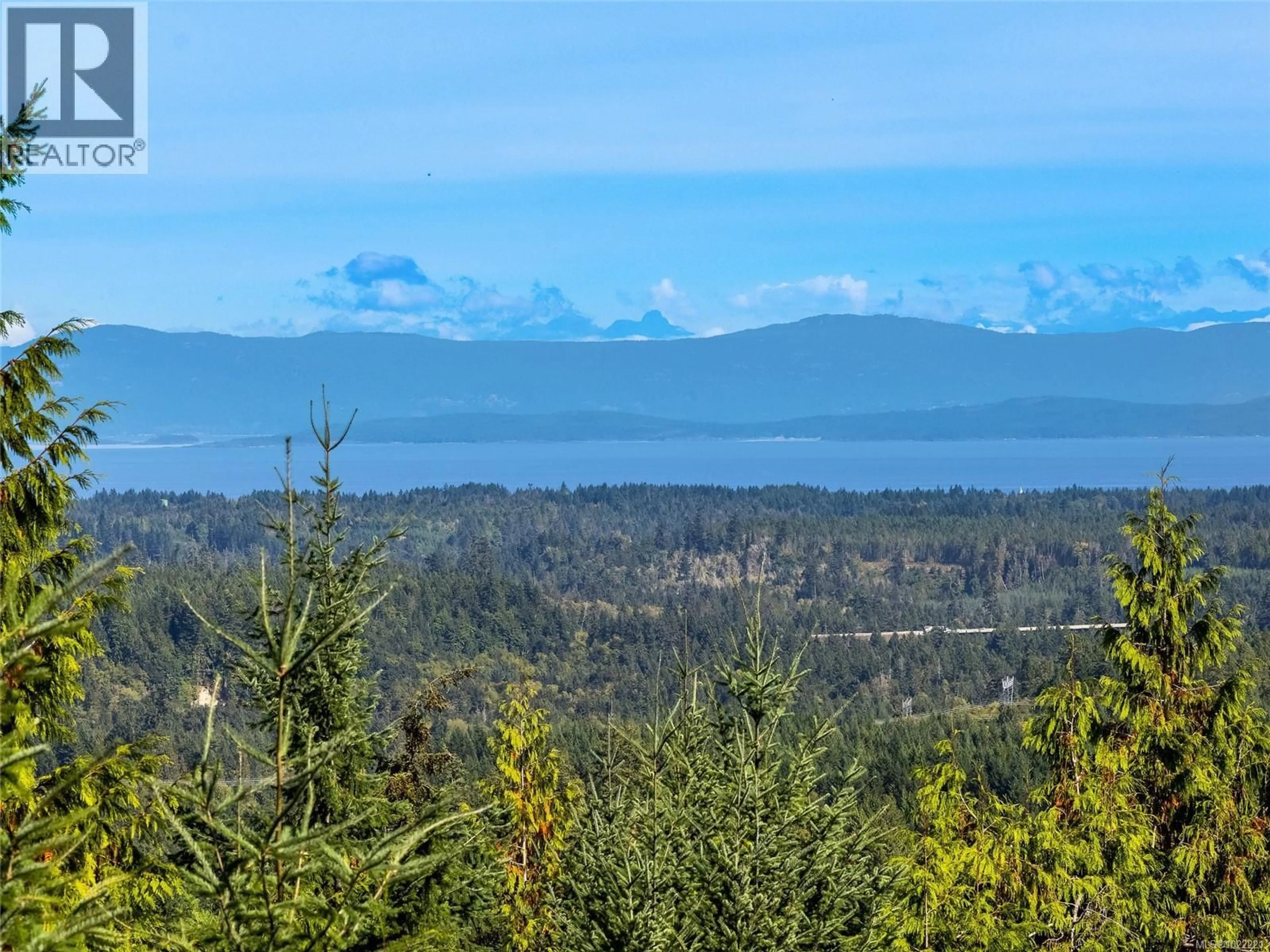A pic from outside/outdoor area/front of a property/back of a property/a pic from drone, water/lake/river/ocean view for 1685 PELIGREN PLACE, Qualicum Beach British Columbia V9K2S3