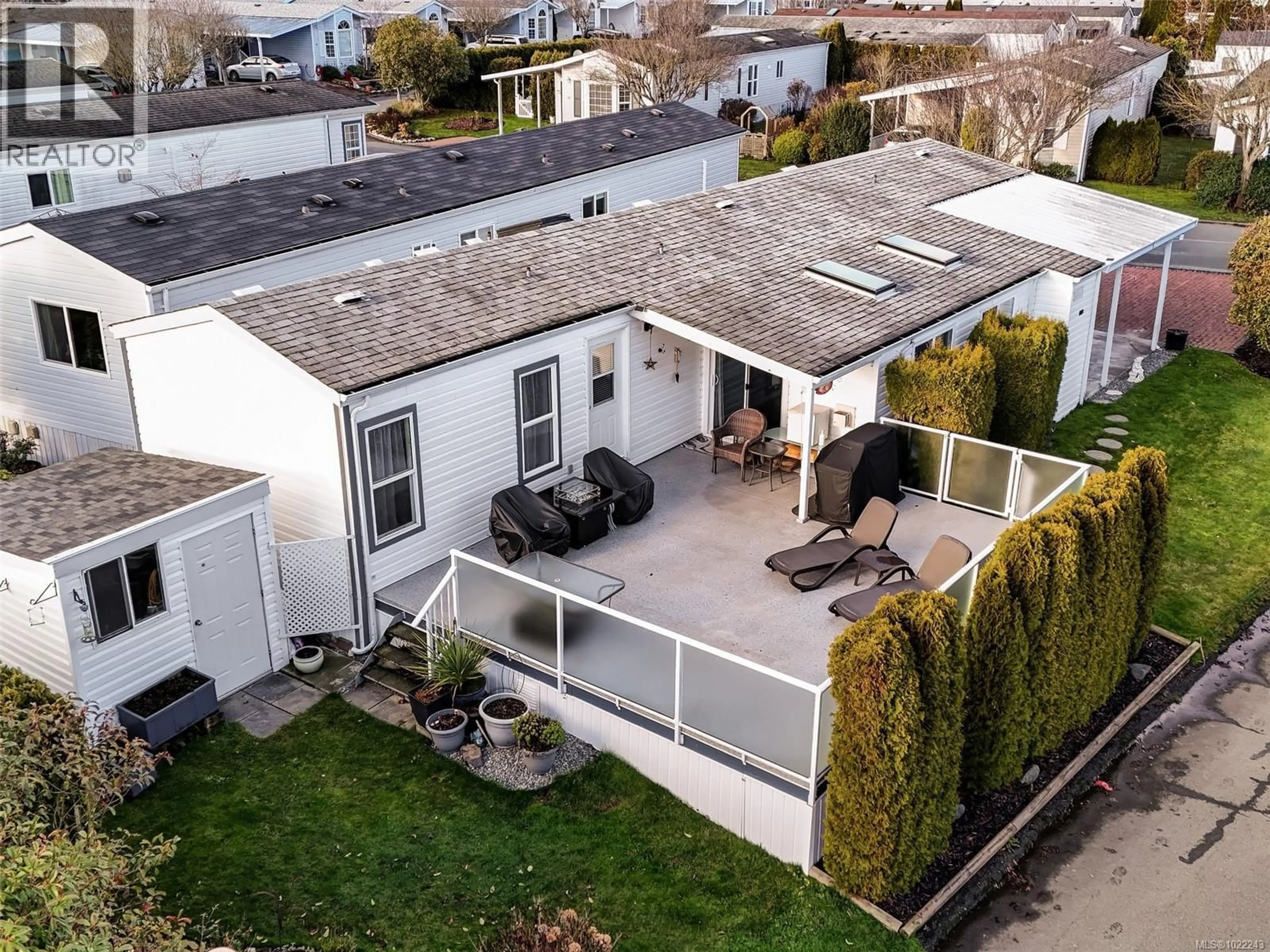 A pic from outside/outdoor area/front of a property/back of a property/a pic from drone, street for 115 - 7583 CENTRAL SAANICH ROAD, Central Saanich British Columbia V8M2B6