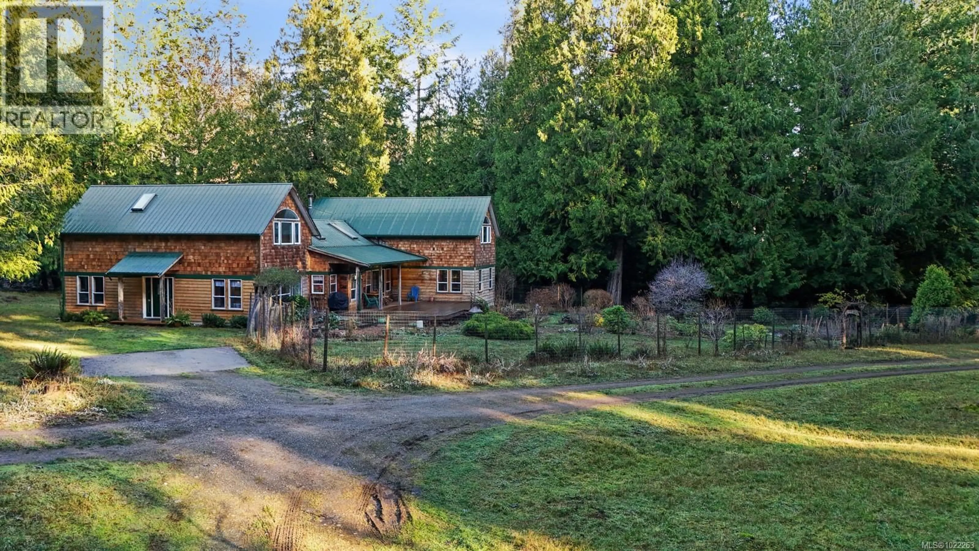 A pic from outside/outdoor area/front of a property/back of a property/a pic from drone, unknown for 8875 OWL CRESCENT, Denman Island British Columbia V0R1T0