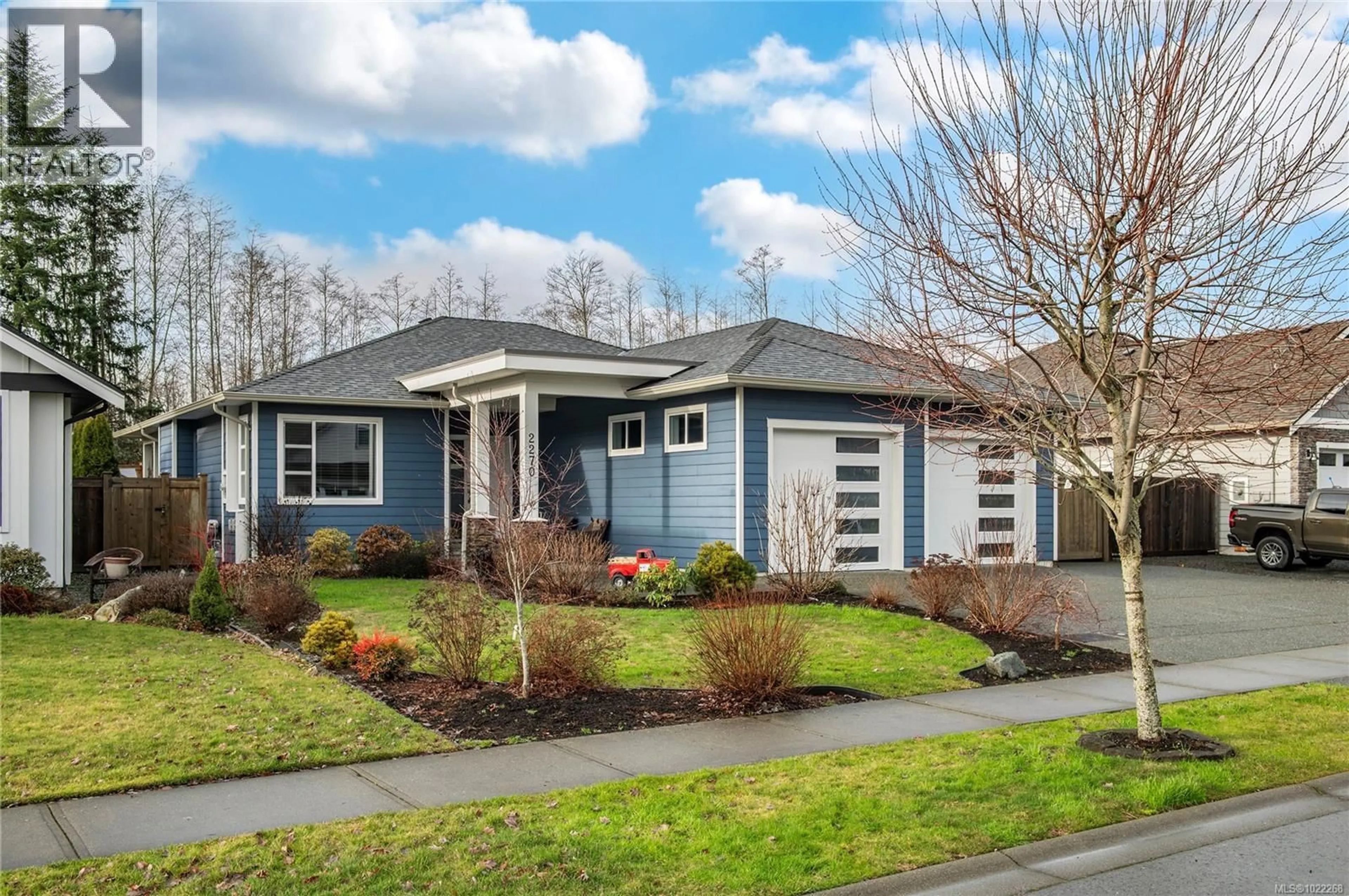 Home with vinyl exterior material, street for 2270 FOREST GROVE DRIVE, Campbell River British Columbia V9W0C9