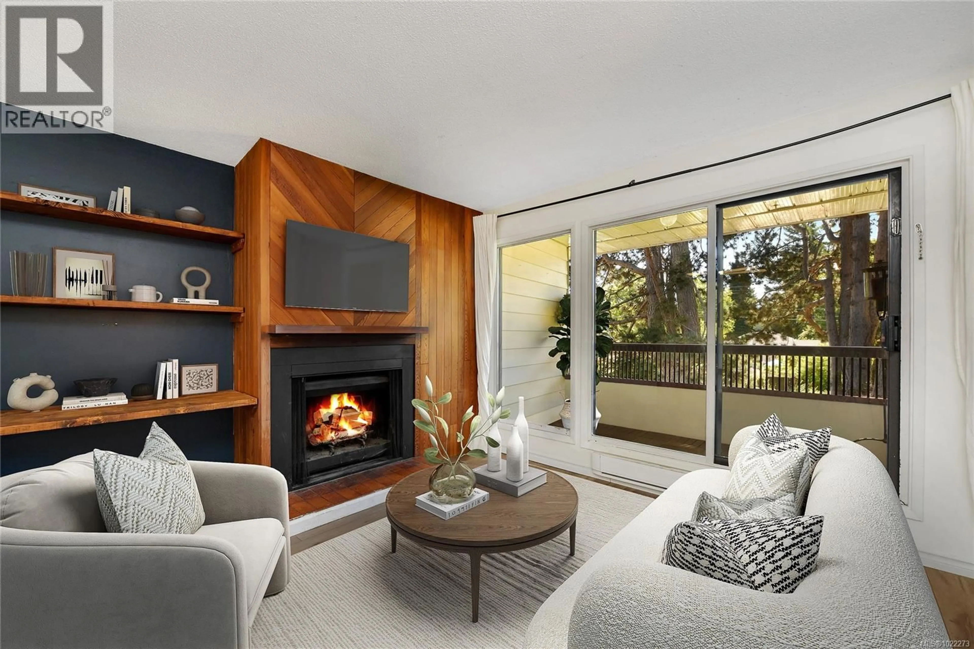 Living room with furniture, wood/laminate floor for 10 - 1956 GLENIDLE ROAD, Sooke British Columbia V9Z0B2