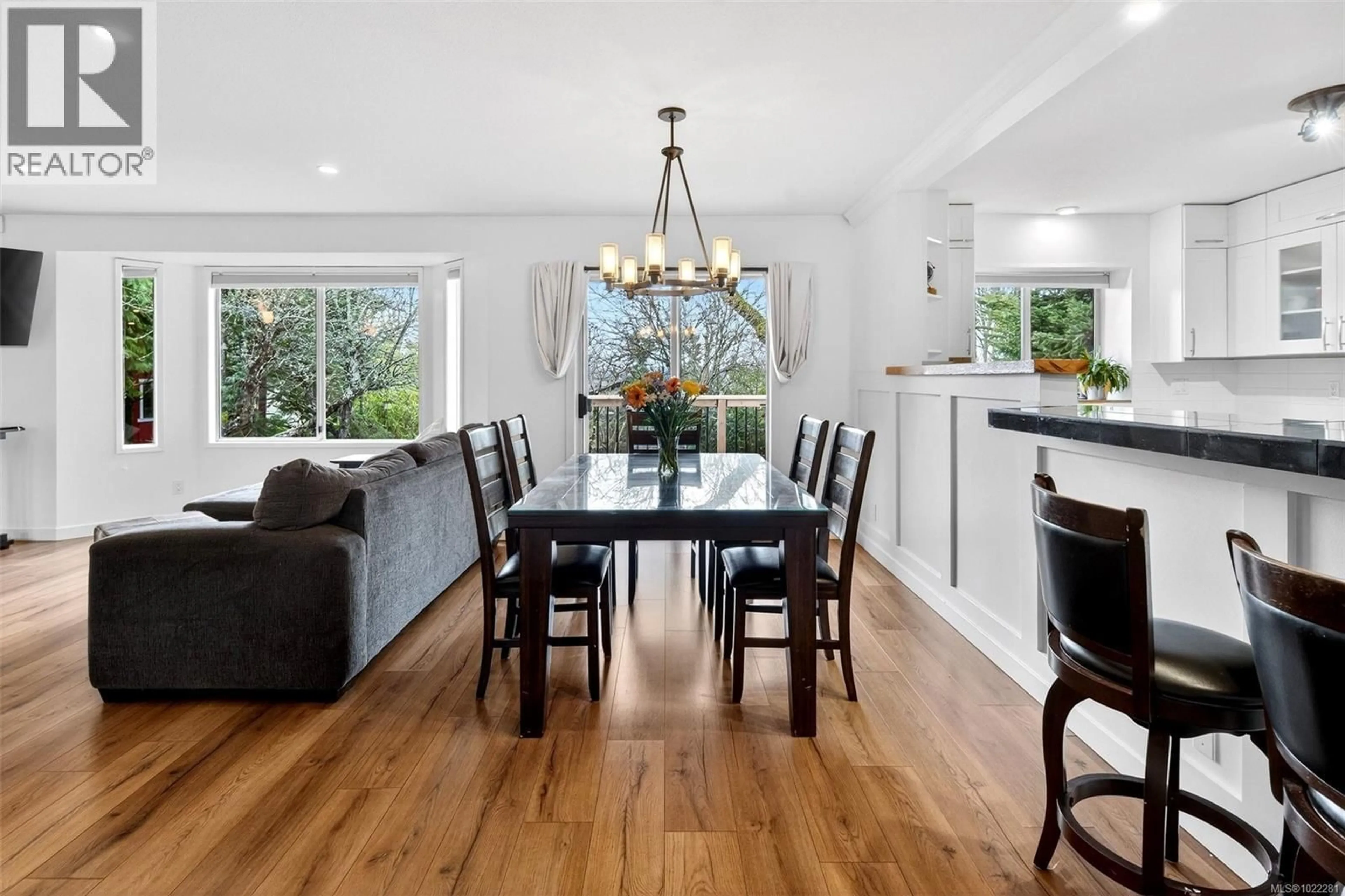 Open concept kitchen, wood/laminate floor for 3990 BOW ROAD, Saanich British Columbia V8N3B1