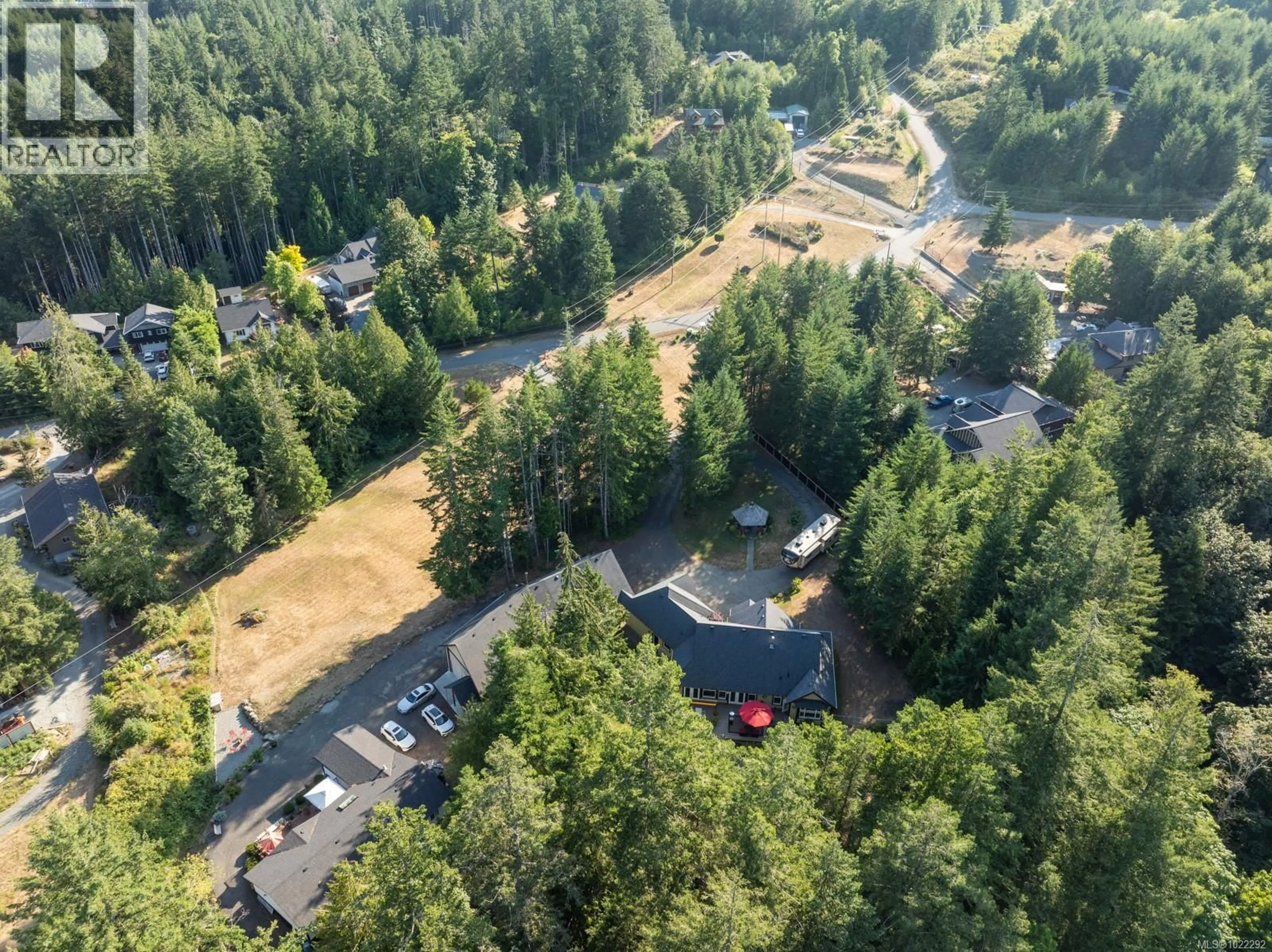 A pic from outside/outdoor area/front of a property/back of a property/a pic from drone, forest/trees view for 3035 SARAH DRIVE, Sooke British Columbia V9Z0J5