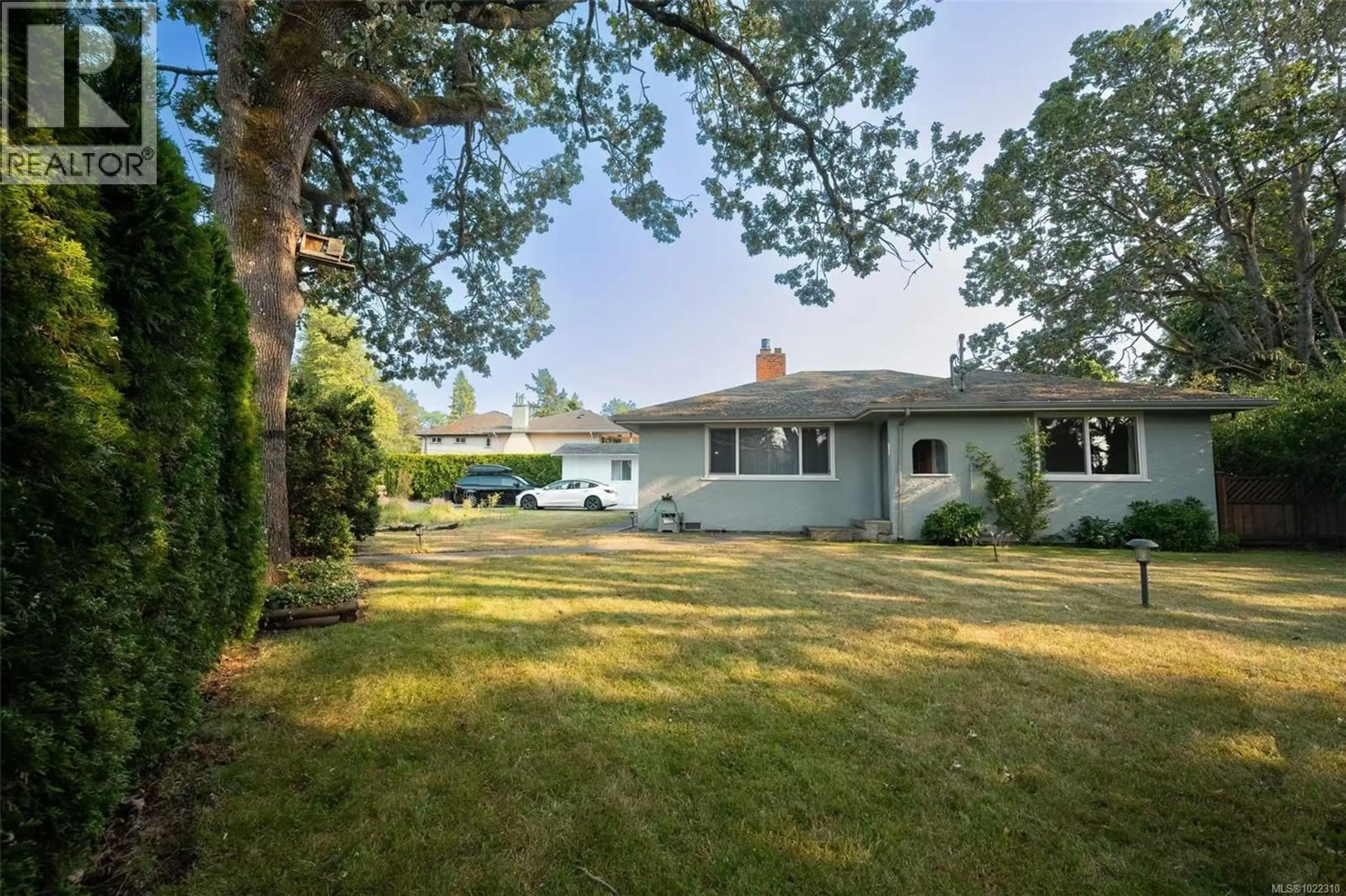 A pic from outside/outdoor area/front of a property/back of a property/a pic from drone, water/lake/river/ocean view for 3956 CEDAR HILL CROSS ROAD, Saanich British Columbia V8P2N7