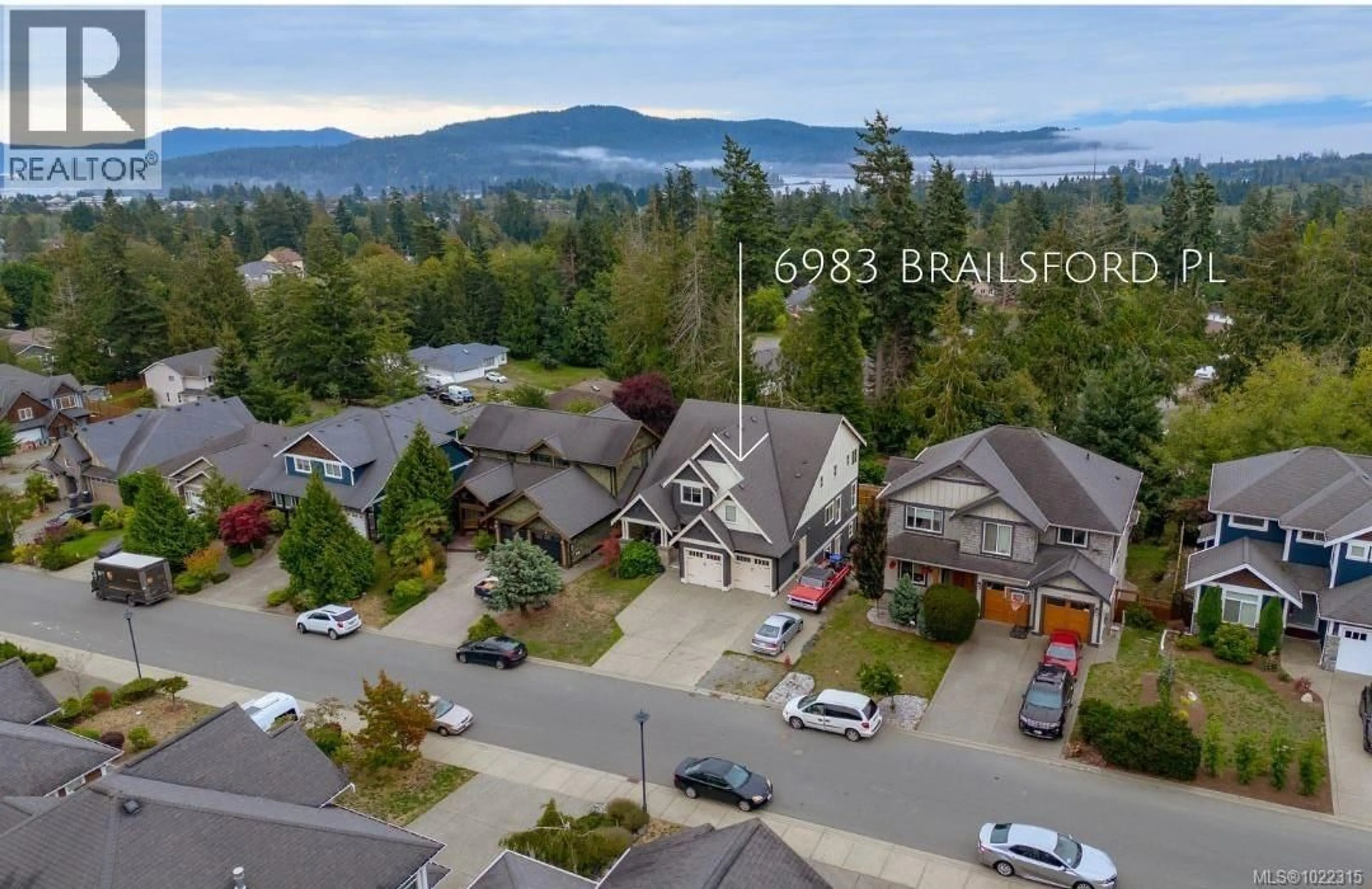 A pic from outside/outdoor area/front of a property/back of a property/a pic from drone, mountain view for 6983 BRAILSFORD PLACE, Sooke British Columbia V9Z1J7