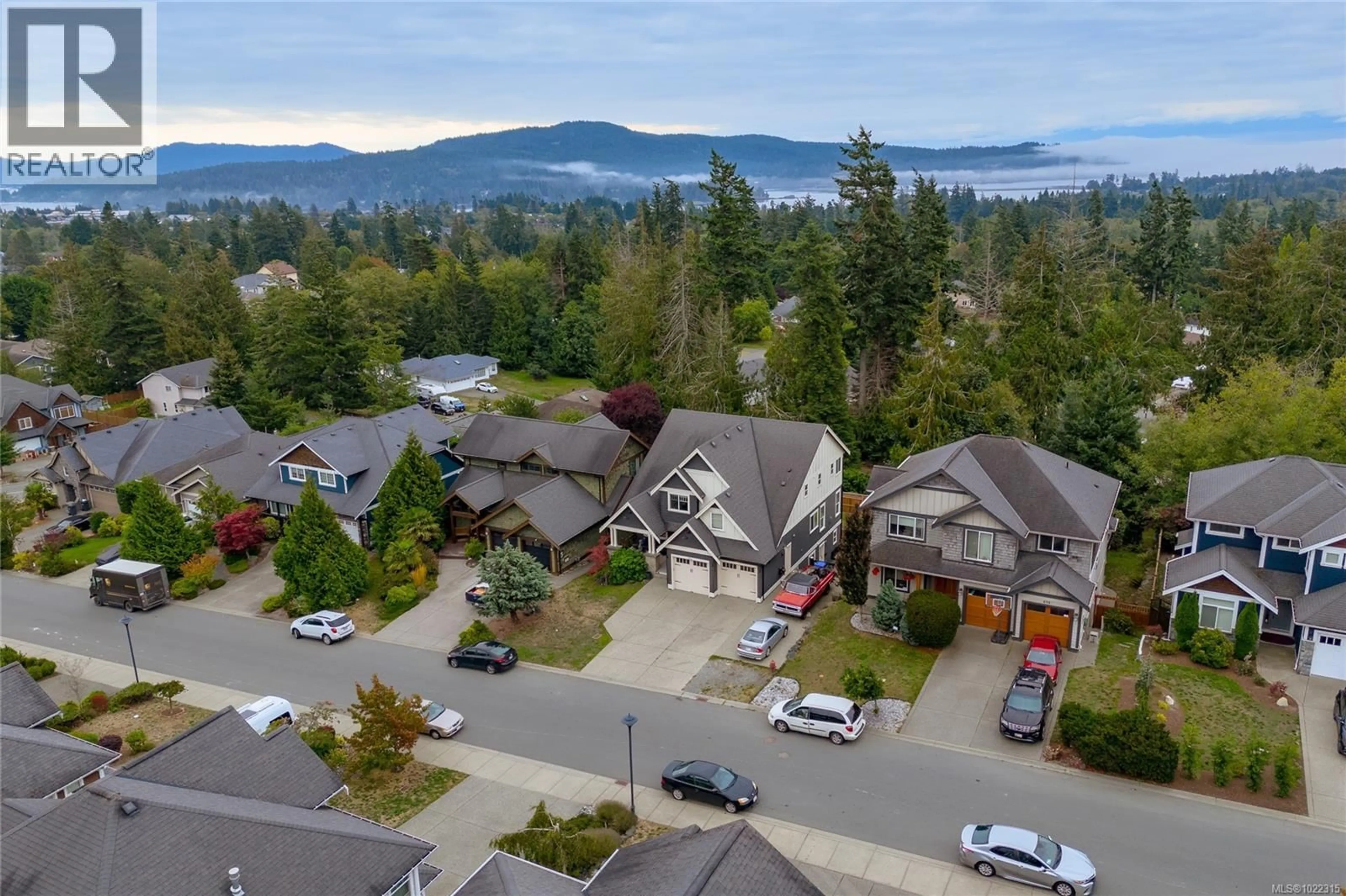A pic from outside/outdoor area/front of a property/back of a property/a pic from drone, mountain view for 6983 BRAILSFORD PLACE, Sooke British Columbia V9Z1J7