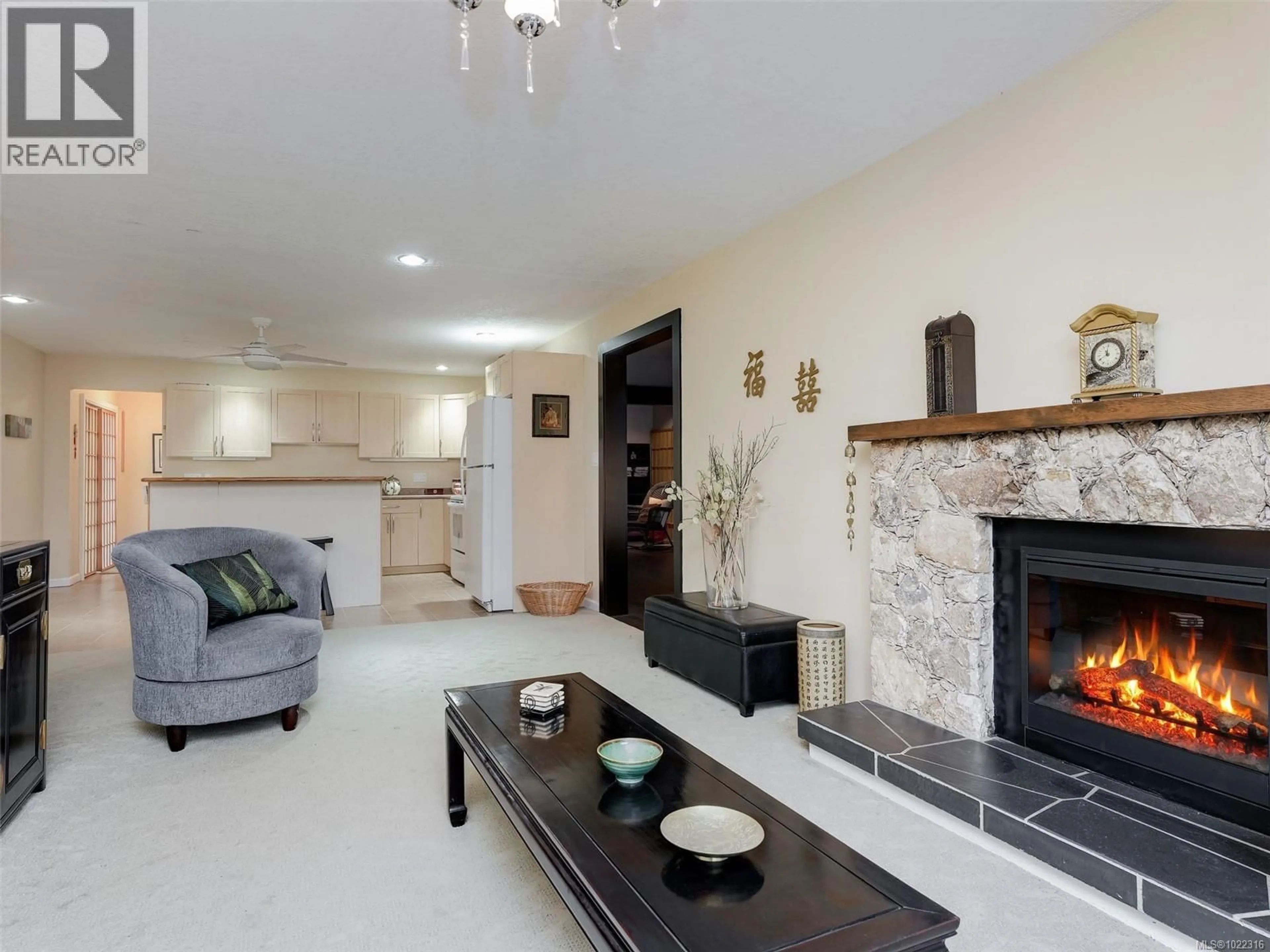 Living room with furniture, ceramic/tile floor for 9907 GALARAN ROAD, Sidney British Columbia V8L4G5