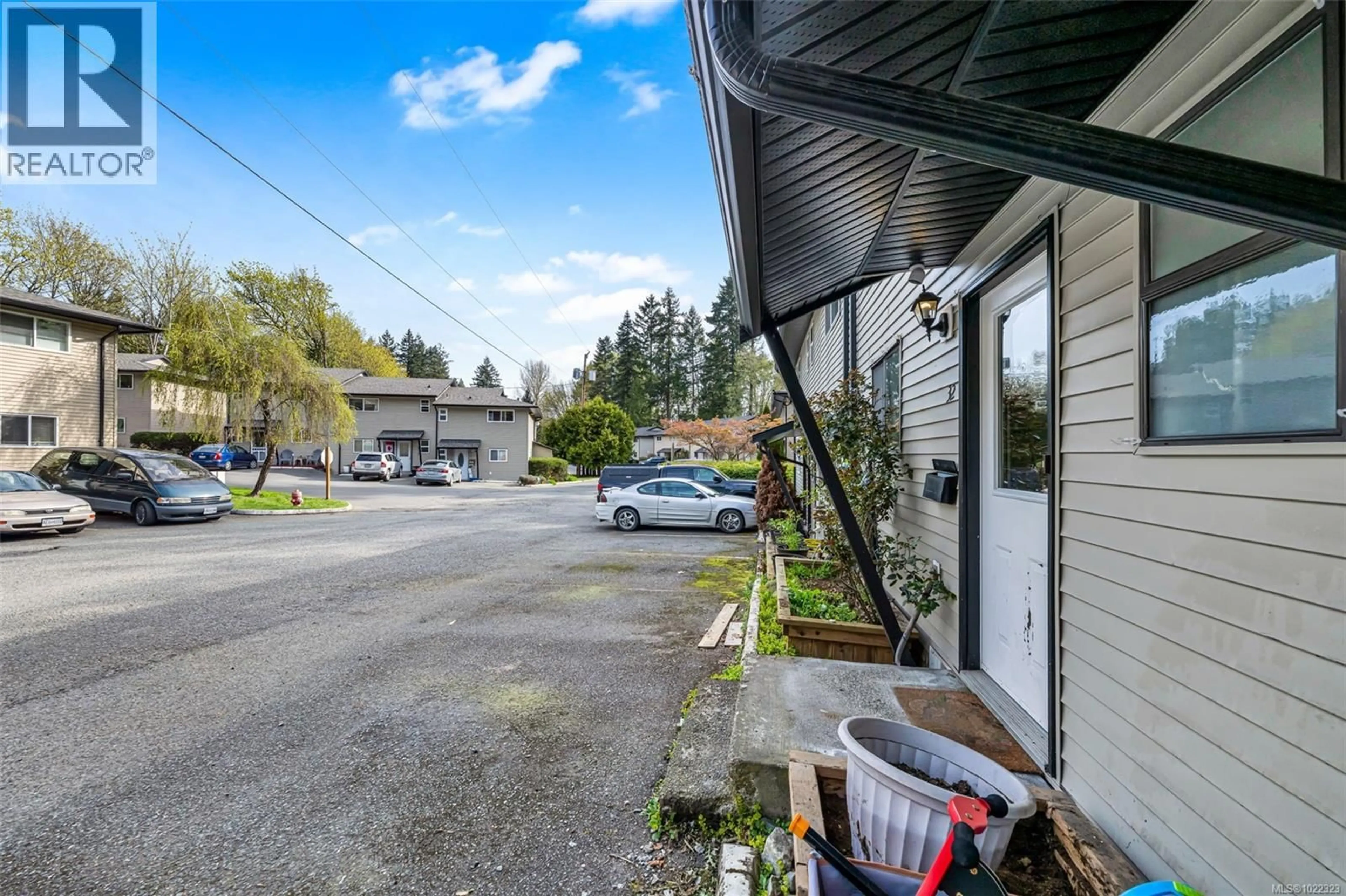 A pic from outside/outdoor area/front of a property/back of a property/a pic from drone, street for 32 - 3025 COWICHAN LAKE ROAD, Duncan British Columbia V9L4B5