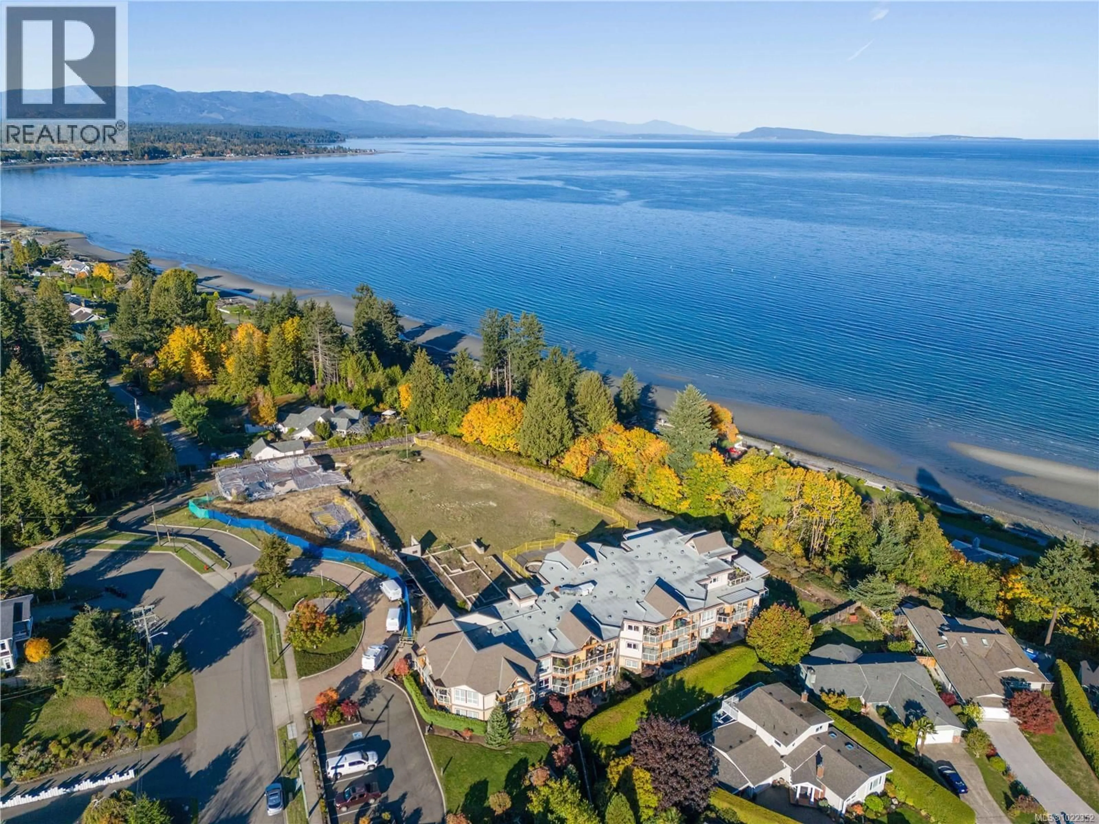 A pic from outside/outdoor area/front of a property/back of a property/a pic from drone, water/lake/river/ocean view for 203 - 439 COLLEGE ROAD, Qualicum Beach British Columbia V9K0B2