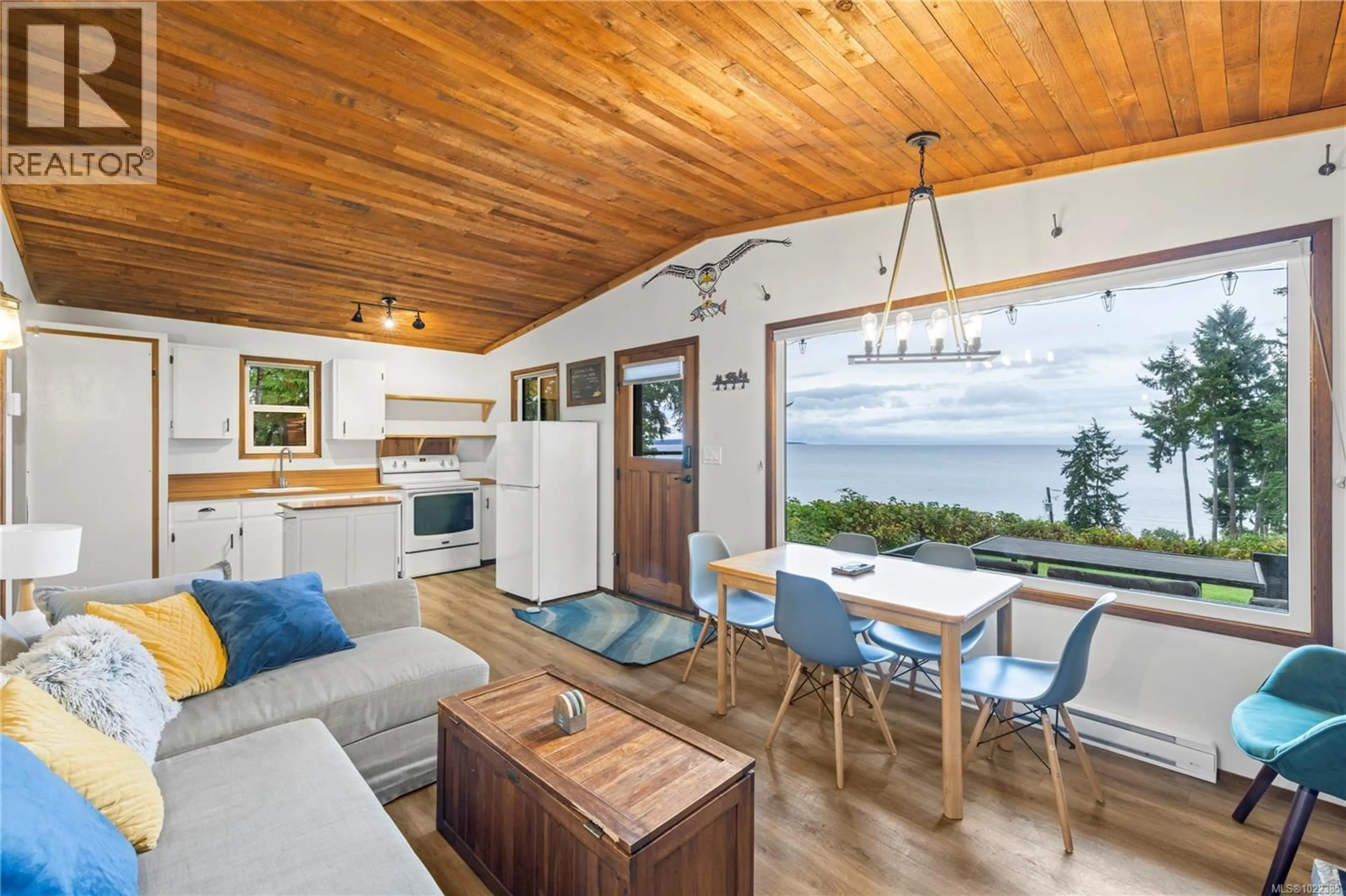 Open concept kitchen, wood/laminate floor for 4 - 4375 KELSEY ROAD, Bowser British Columbia V0R1G0