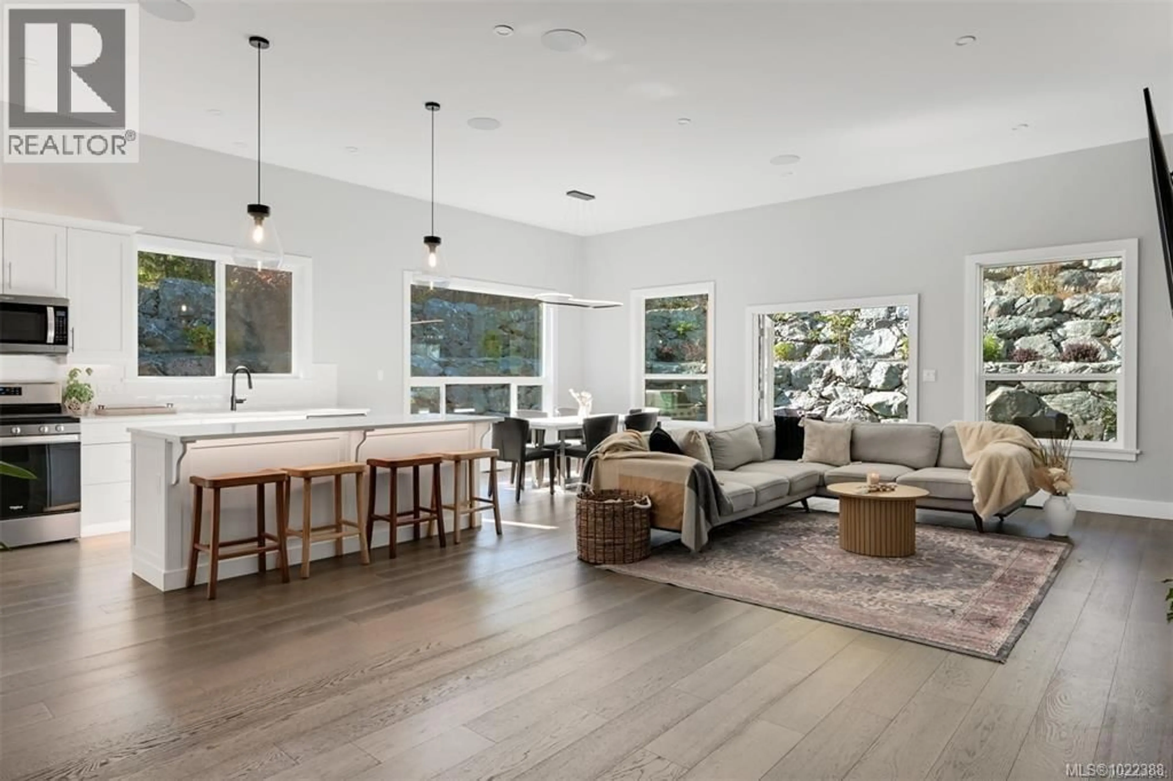 Open concept kitchen, wood/laminate floor for 847 BUCKTAIL ROAD, Mill Bay British Columbia V0R2P1