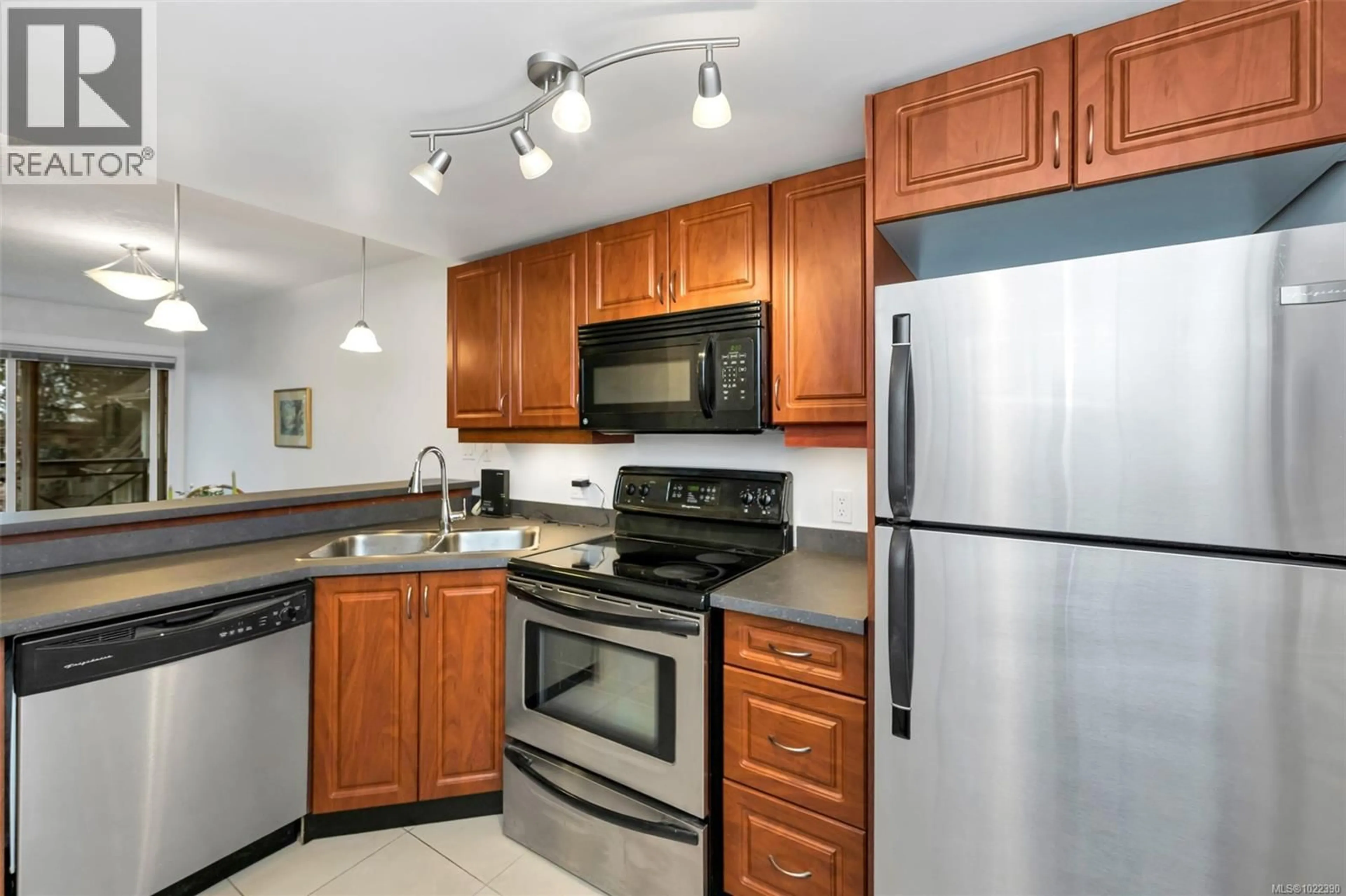 Standard kitchen, ceramic/tile floor for 301 - 4536 VIEWMONT AVENUE, Saanich British Columbia V8Z5L3