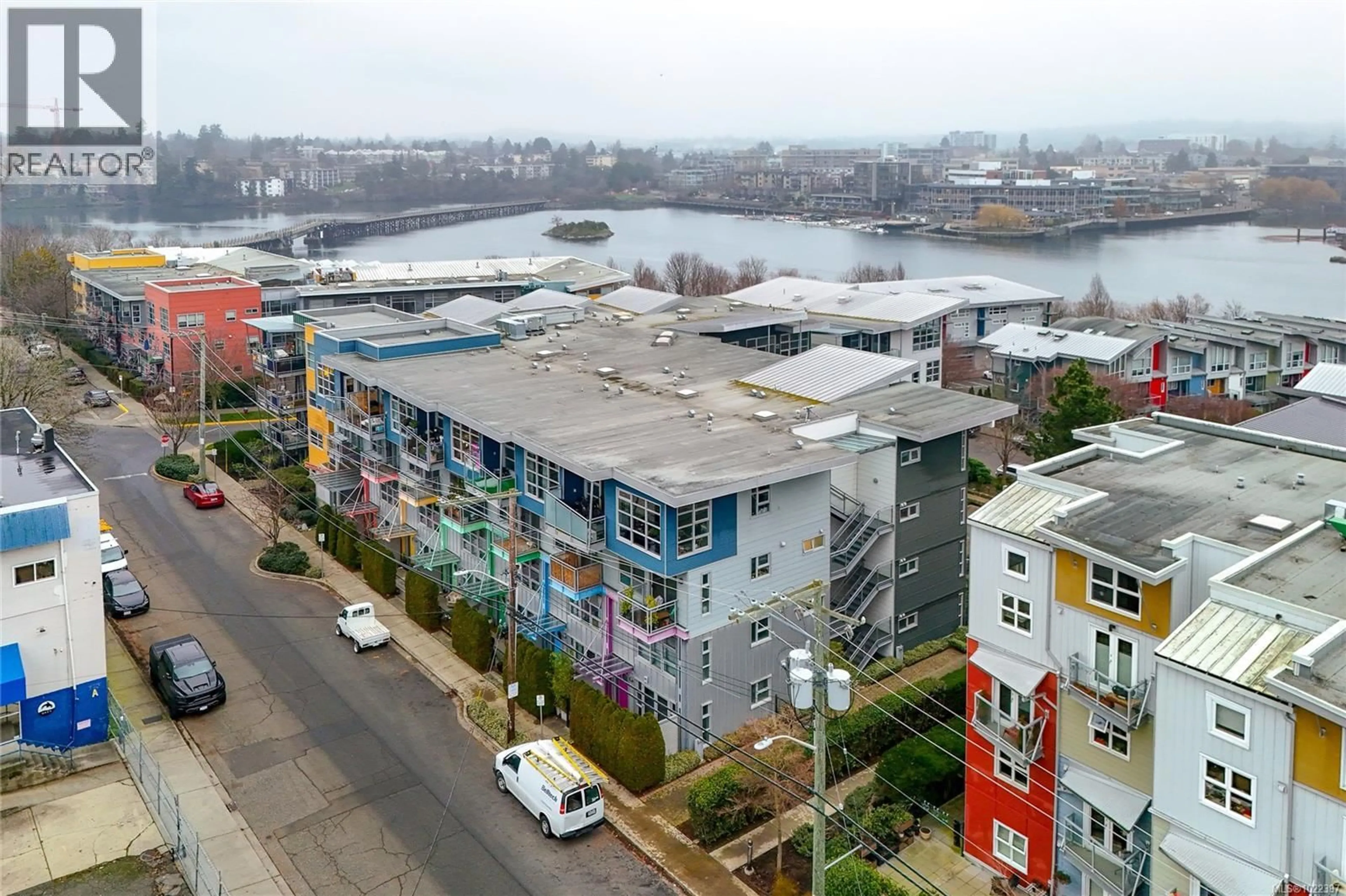 A pic from outside/outdoor area/front of a property/back of a property/a pic from drone, water/lake/river/ocean view for 109 - 797 TYEE ROAD, Victoria British Columbia V9A7R4