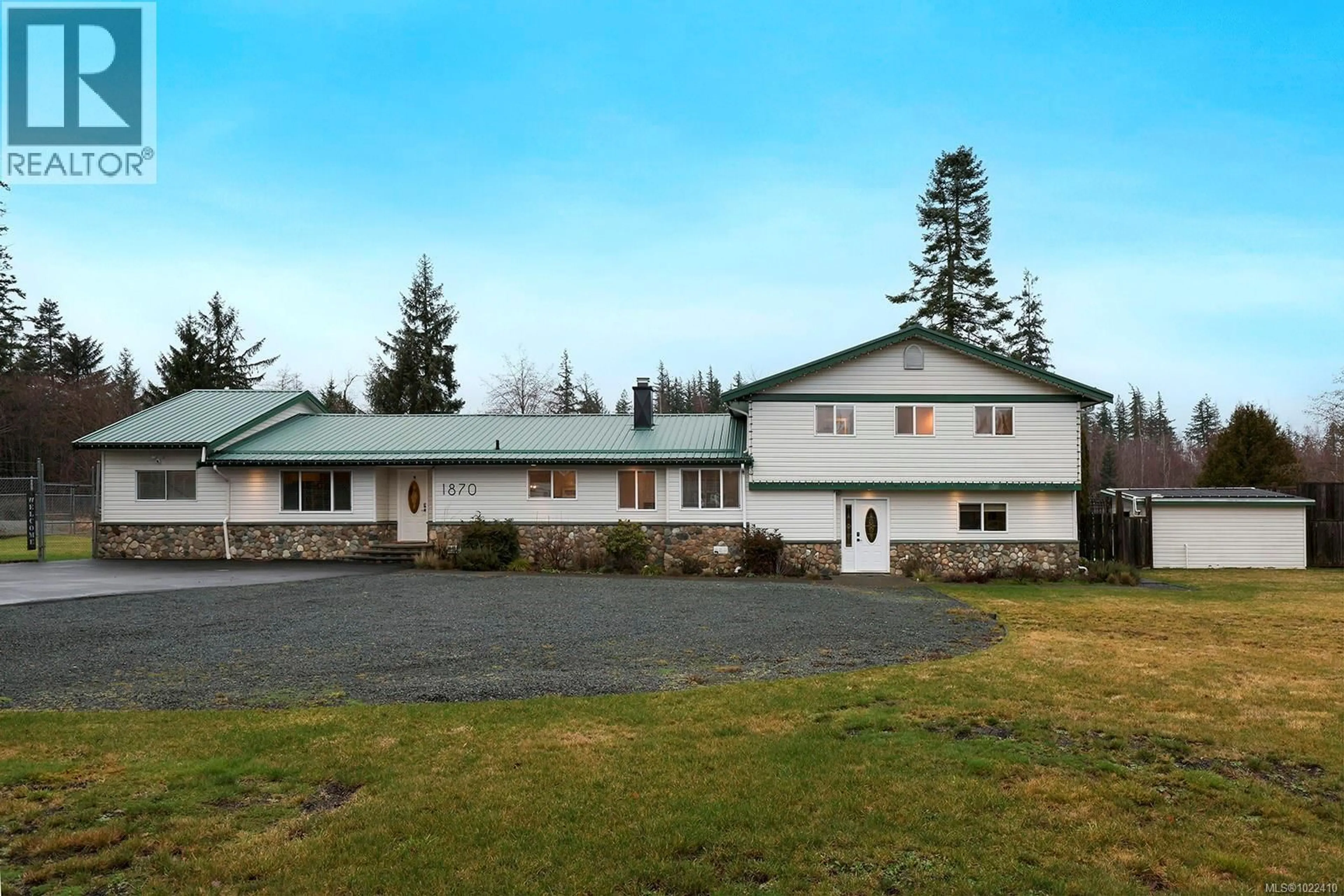 A pic from outside/outdoor area/front of a property/back of a property/a pic from drone, mountain view for 1870 WILLIS ROAD, Campbell River British Columbia V9W3W1