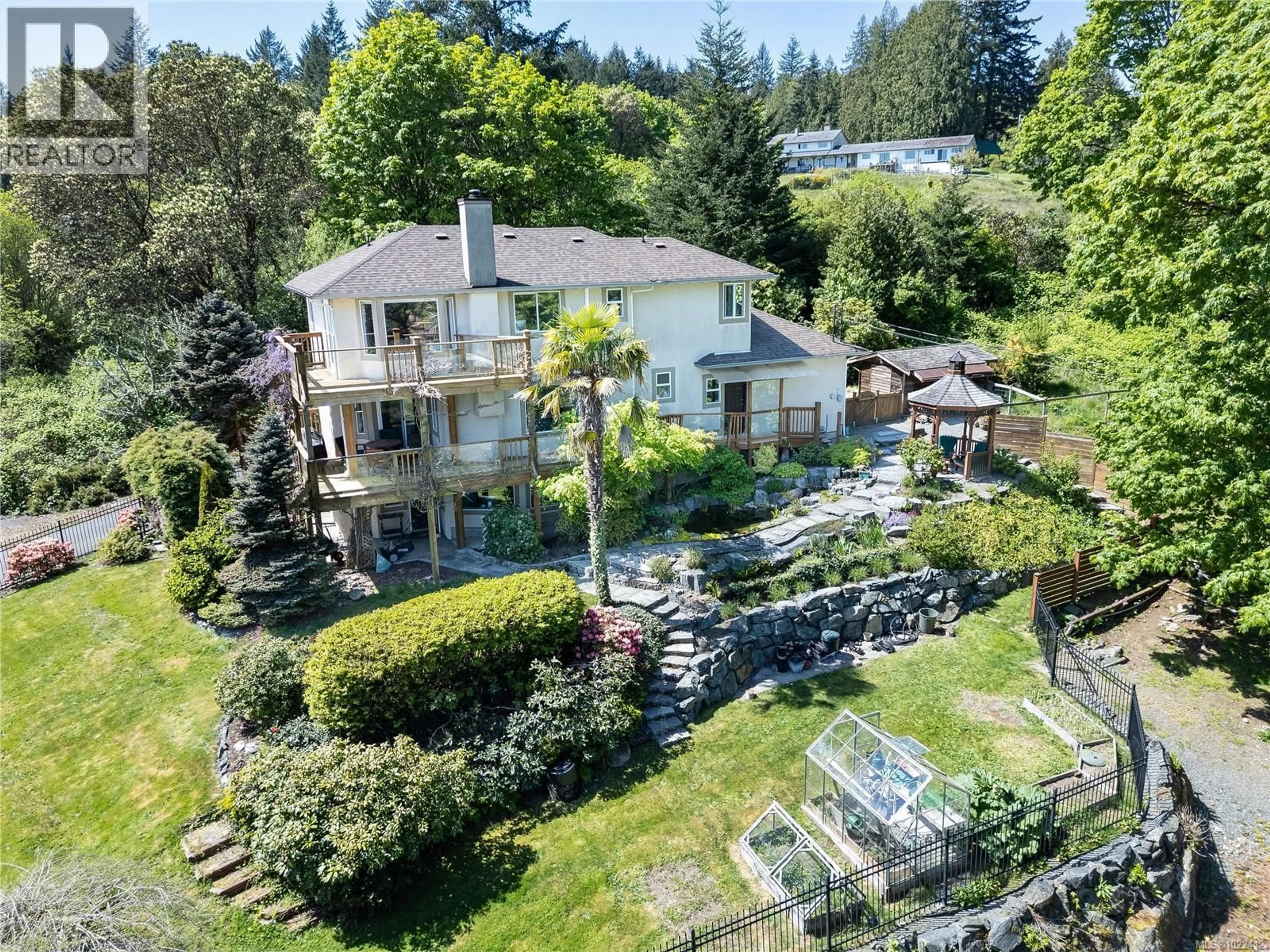 A pic from outside/outdoor area/front of a property/back of a property/a pic from drone, unknown for 4910 ROCKY POINT ROAD, Metchosin British Columbia V9C4G4
