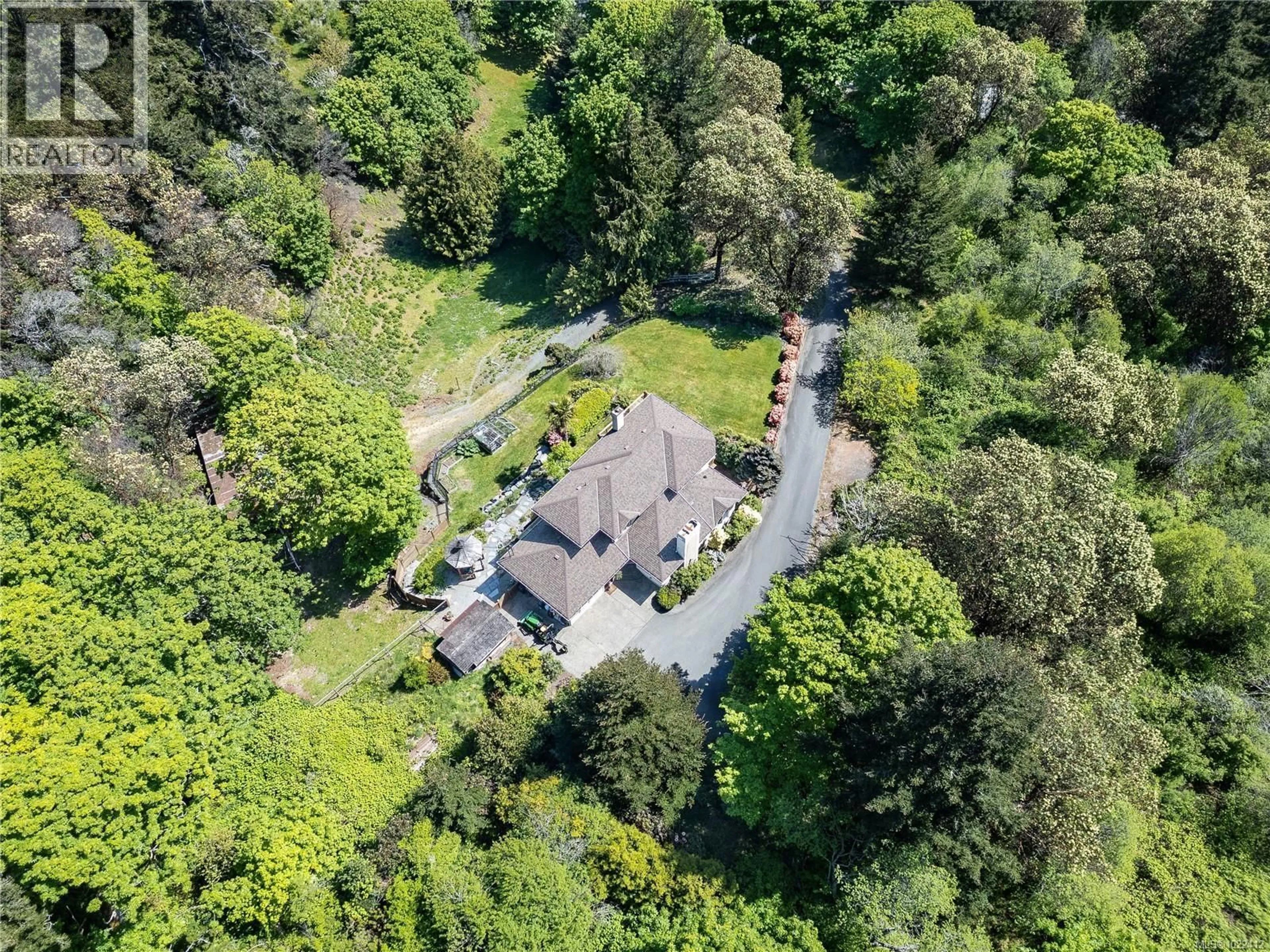 A pic from outside/outdoor area/front of a property/back of a property/a pic from drone, forest/trees view for 4910 ROCKY POINT ROAD, Metchosin British Columbia V9C4G4