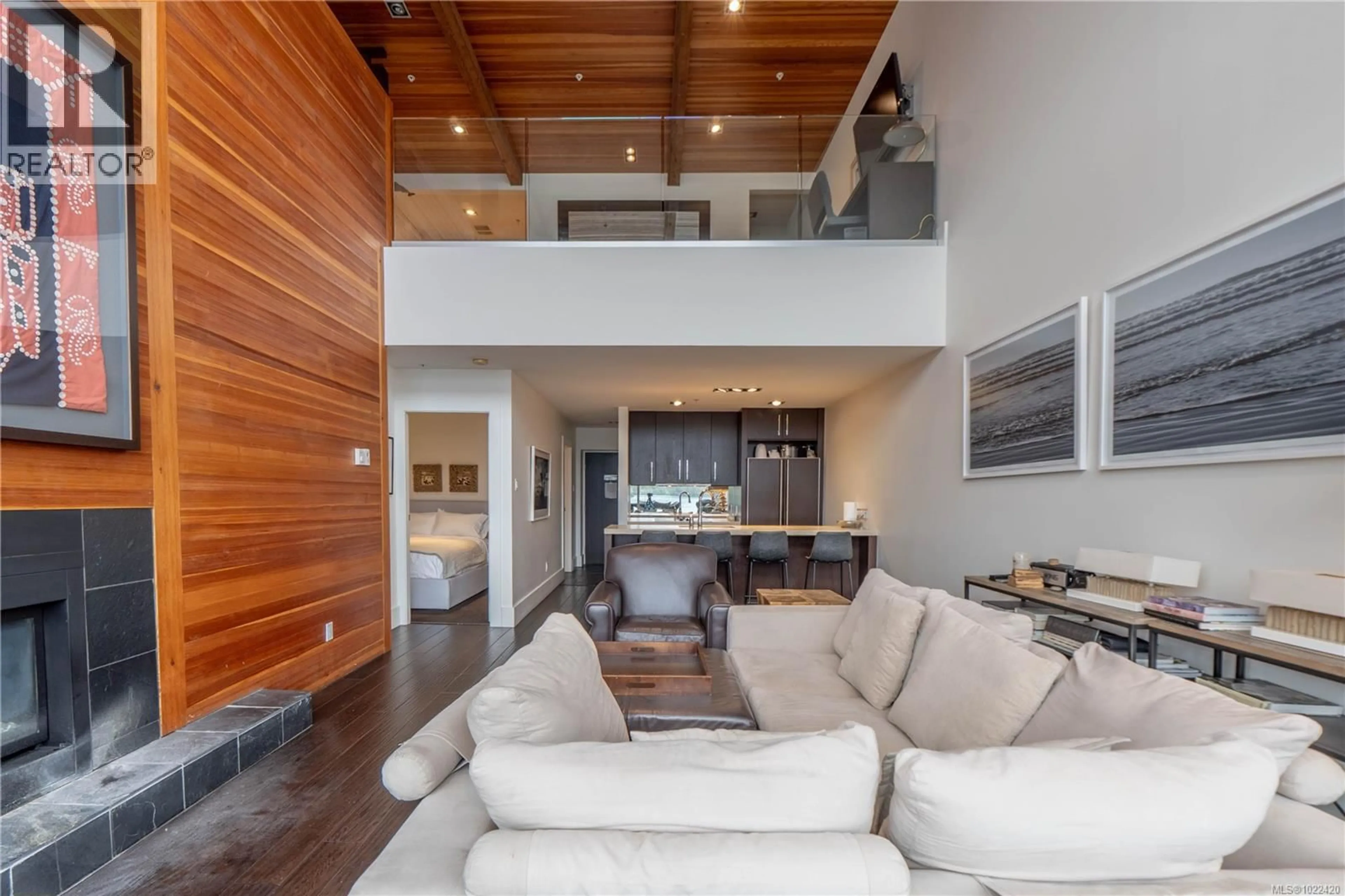 Living room with furniture, wood/laminate floor for 304 - 368 MAIN STREET, Tofino British Columbia V0R2Z0
