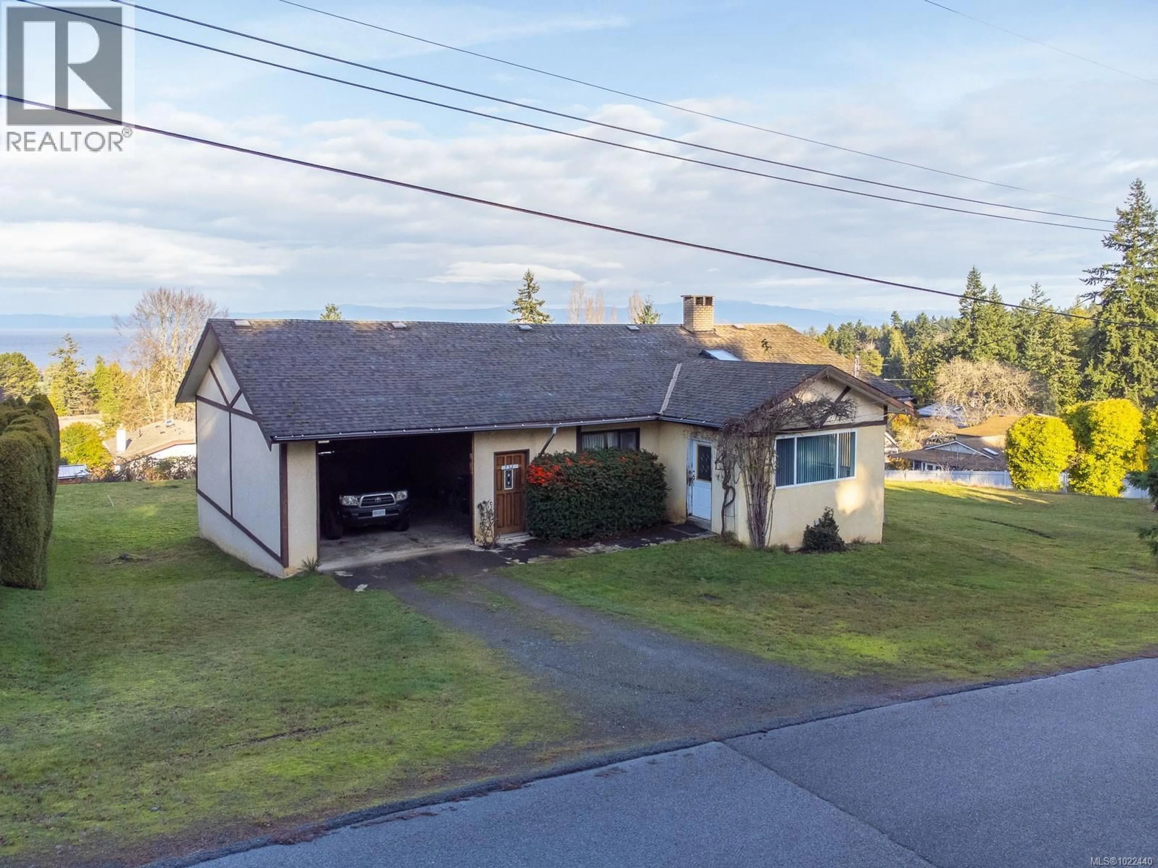 A pic from outside/outdoor area/front of a property/back of a property/a pic from drone, street for 135 SUNNINGDALE ROAD WEST, Qualicum Beach British Columbia V9K1K7