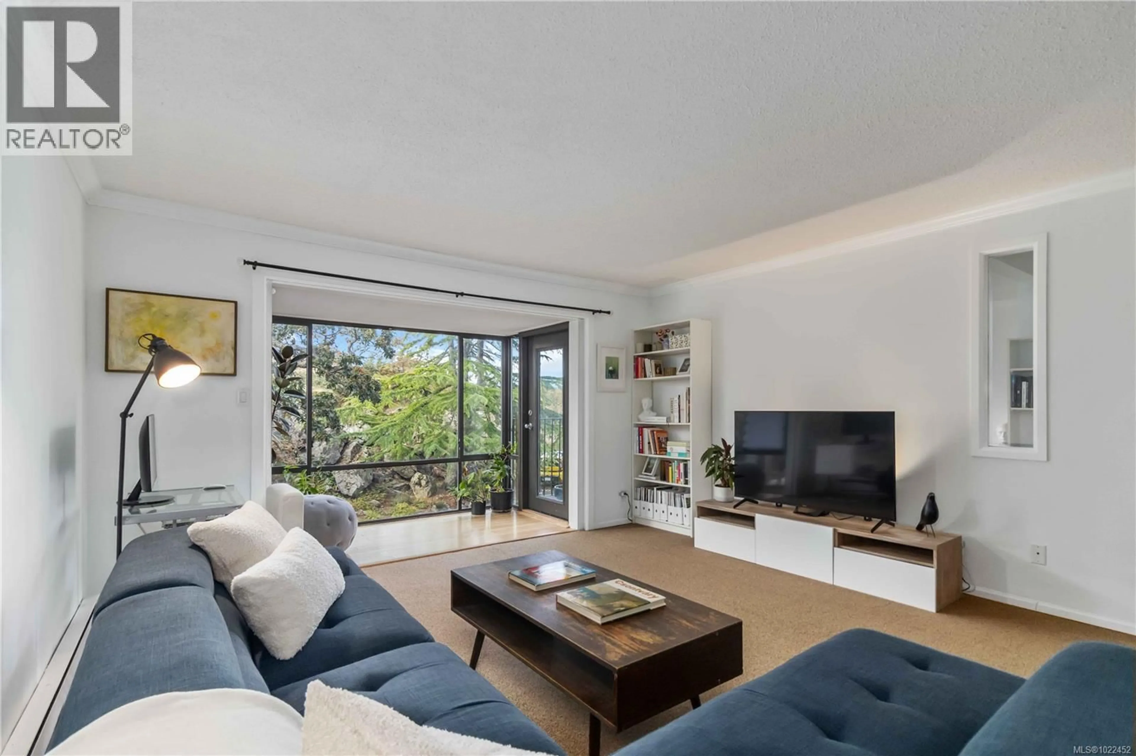 Living room with furniture, unknown for 410 - 1433 FAIRCLIFF LANE, Victoria British Columbia V8S3J6