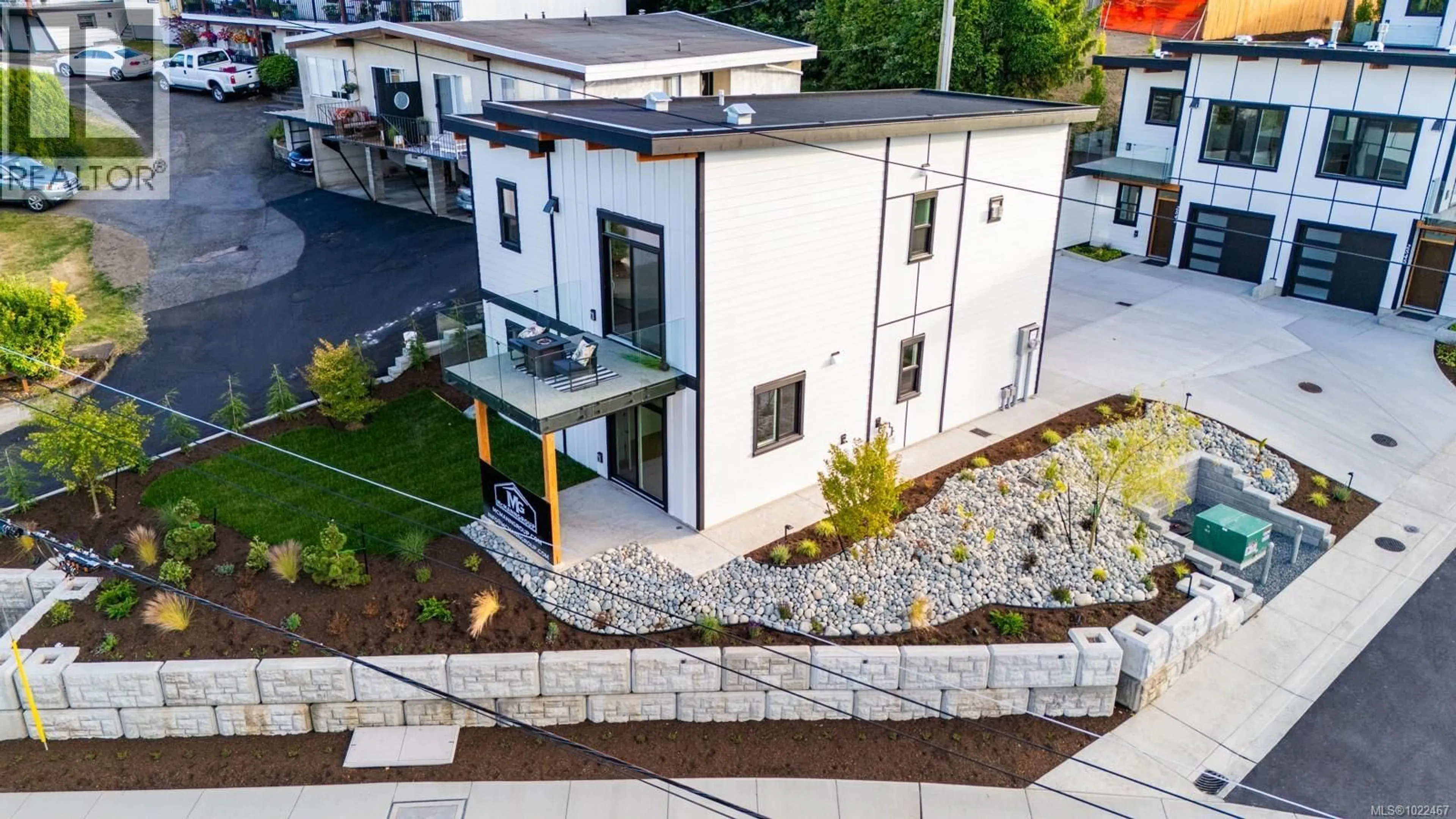 A pic from outside/outdoor area/front of a property/back of a property/a pic from drone, street for 2541 DOCTORS ROAD, Nanaimo British Columbia V9S3V4
