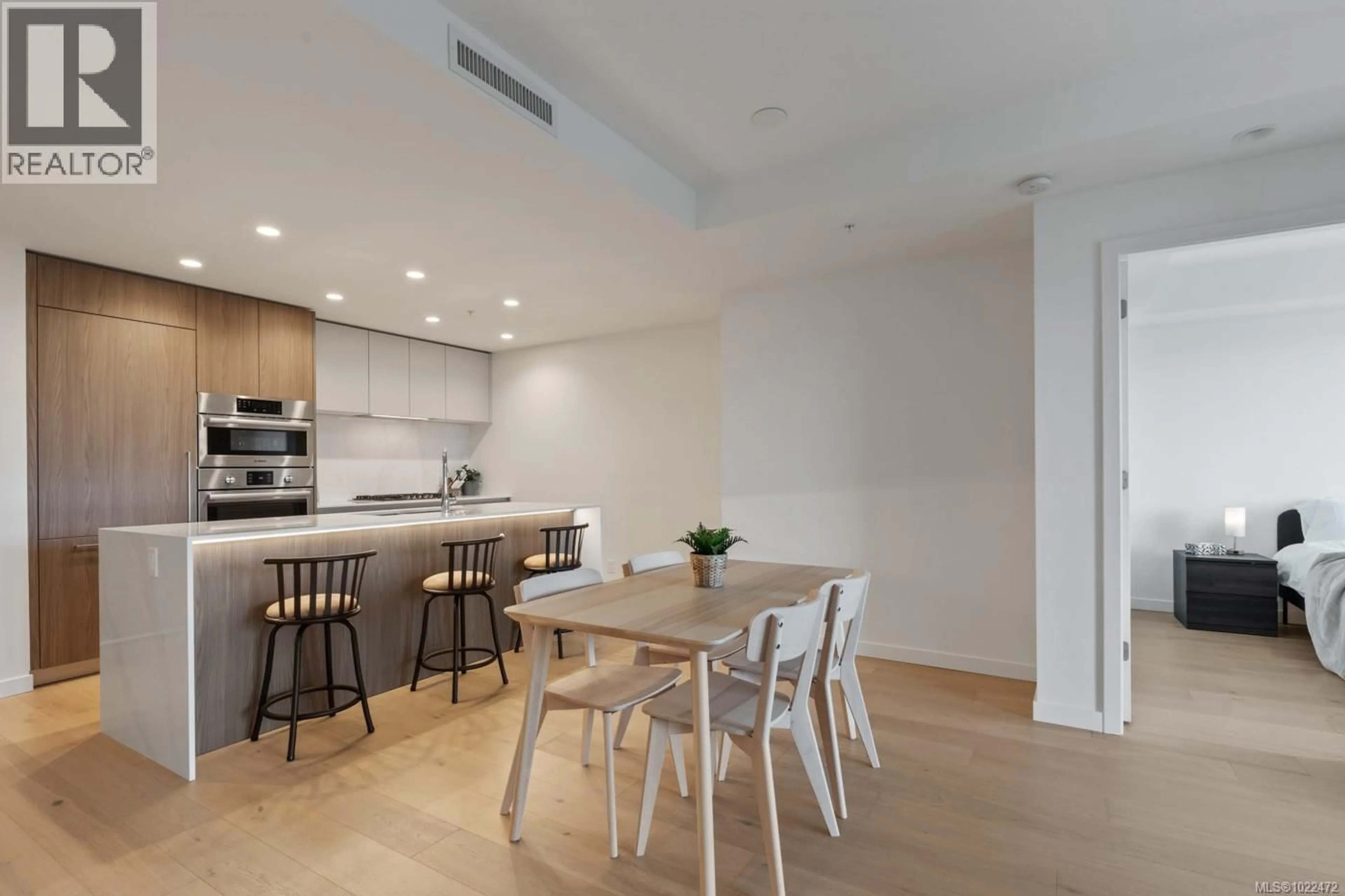 Open concept kitchen, wood/laminate floor for 1012 - 2000 HANNINGTON ROAD, Langford British Columbia V9B6R6